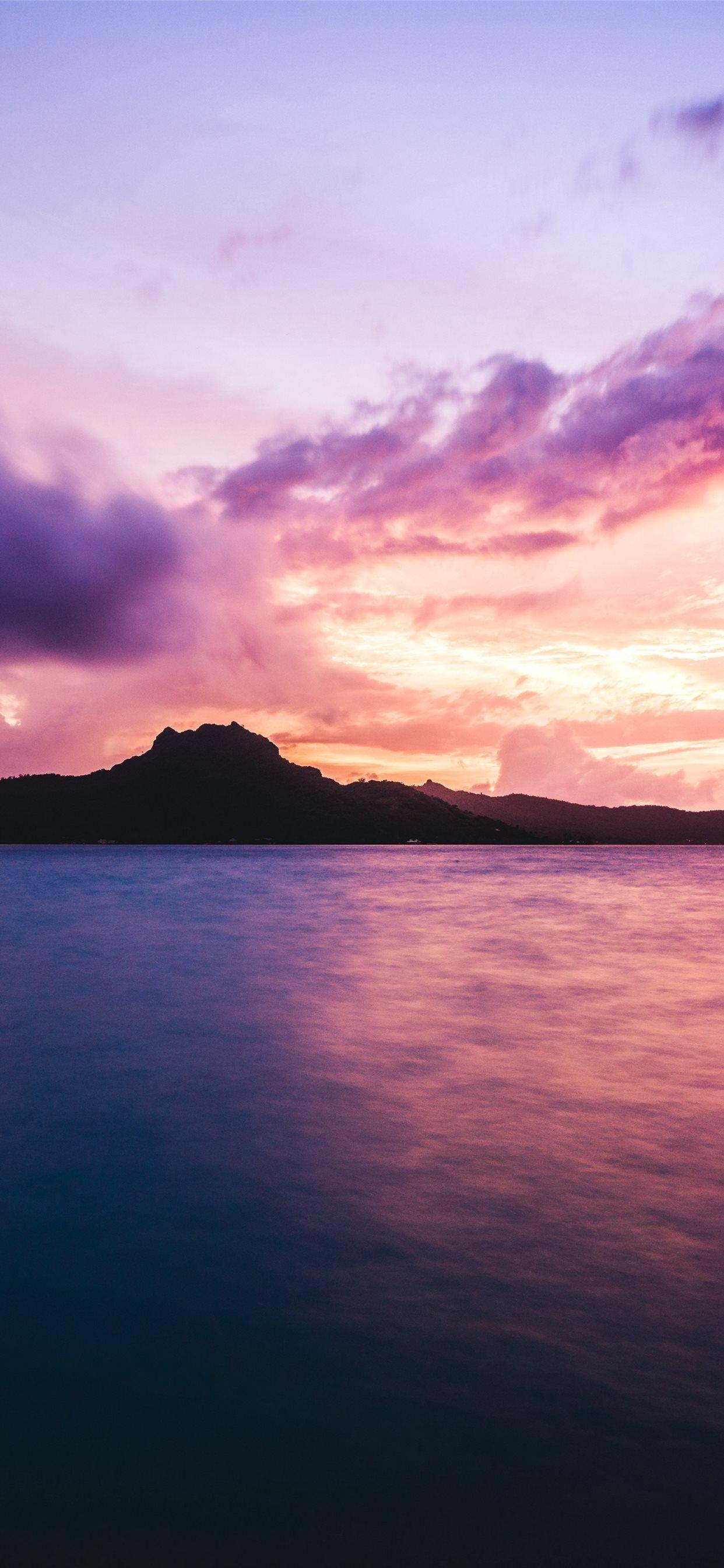 1242x2688 ocean rocks clouds bora bora iPhone Wallpaper Free Download