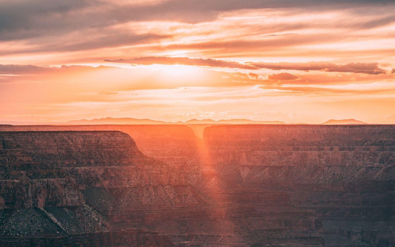 1280x800 Download wallpaper 1280x800 canyon, sunrise, sunshine, clouds
