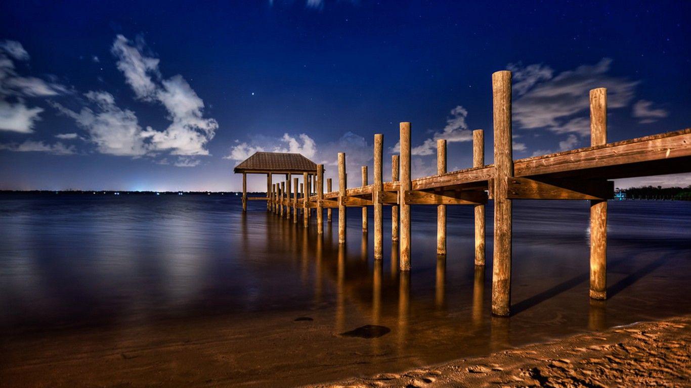1366x768 Piers Tag wallpaper: Pier Docks Sky Beautiful Piers Clouds Sunsets