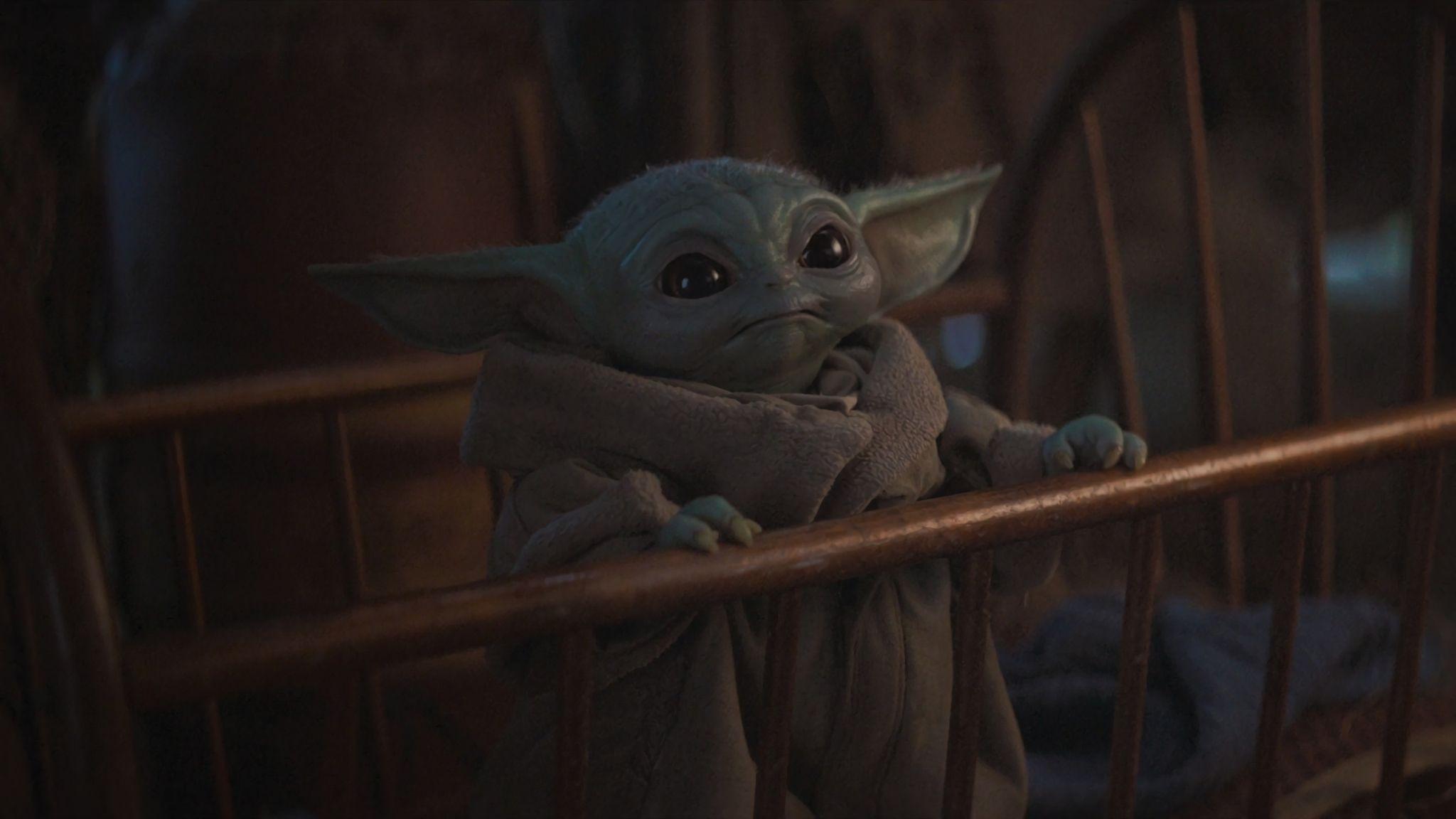 2048x1152 Cute Baby Yoda from Mandalorian 2048x1152 Resolution