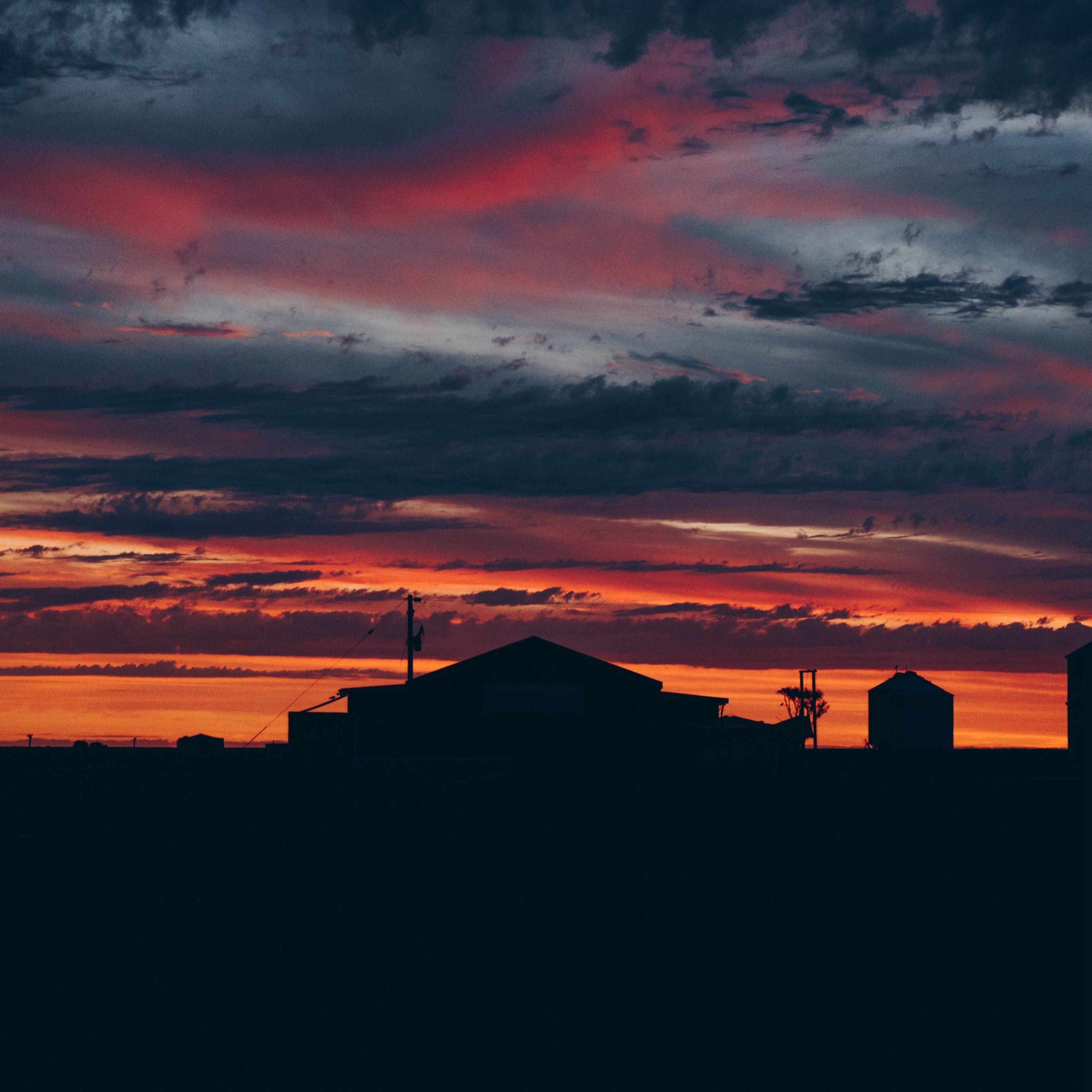 2732x2732 Sky Sunset Building Cloudy Clouds iPad Pro Wallpaper Free Download