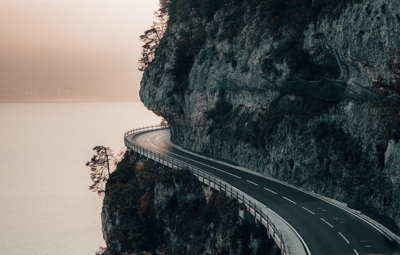 1332x850 Wallpaper road, sea, landscape, nature, mountain, rocks, bokeh