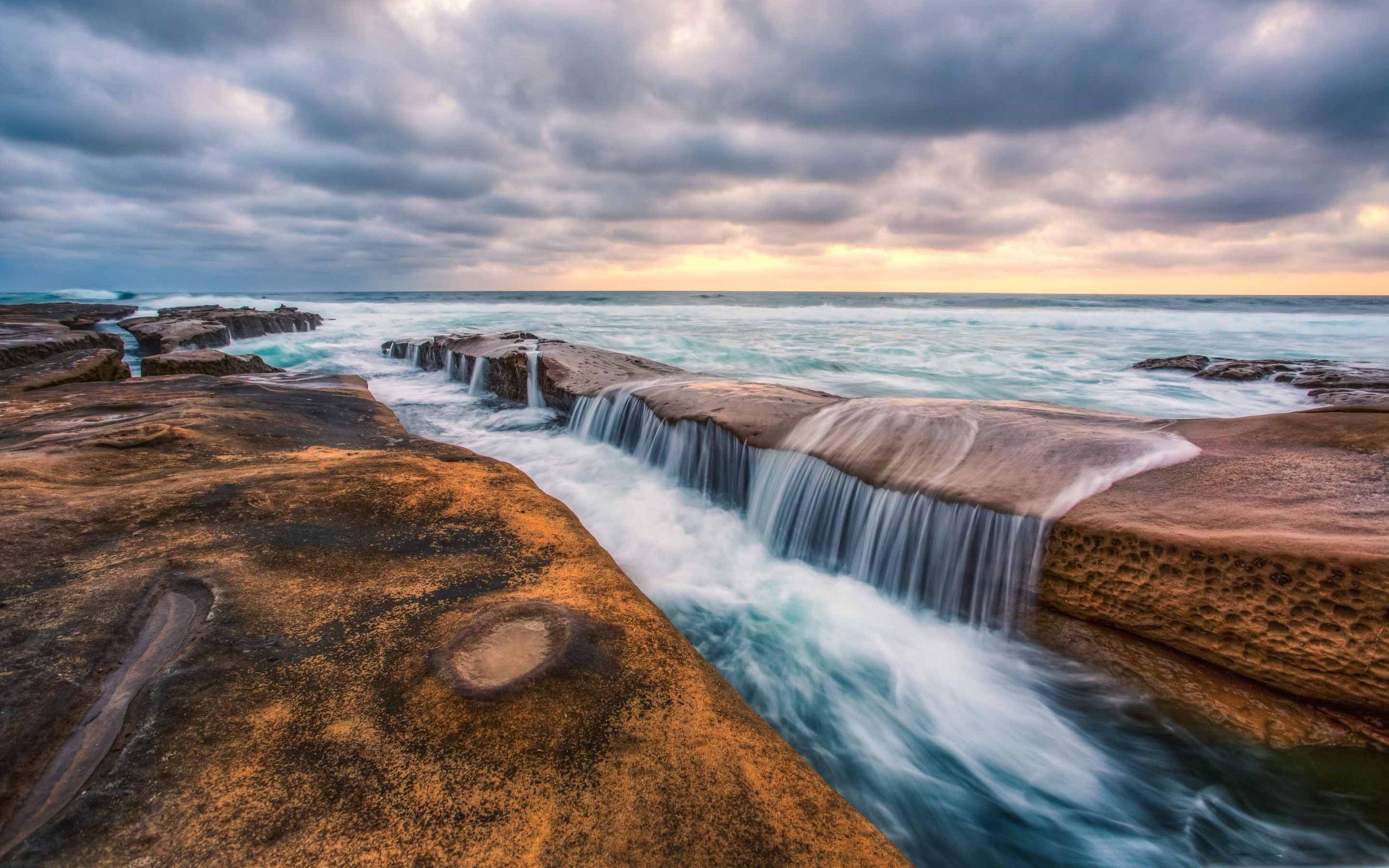2560x1600 Pacific Ocean Rocks MacBook Air Wallpaper Download