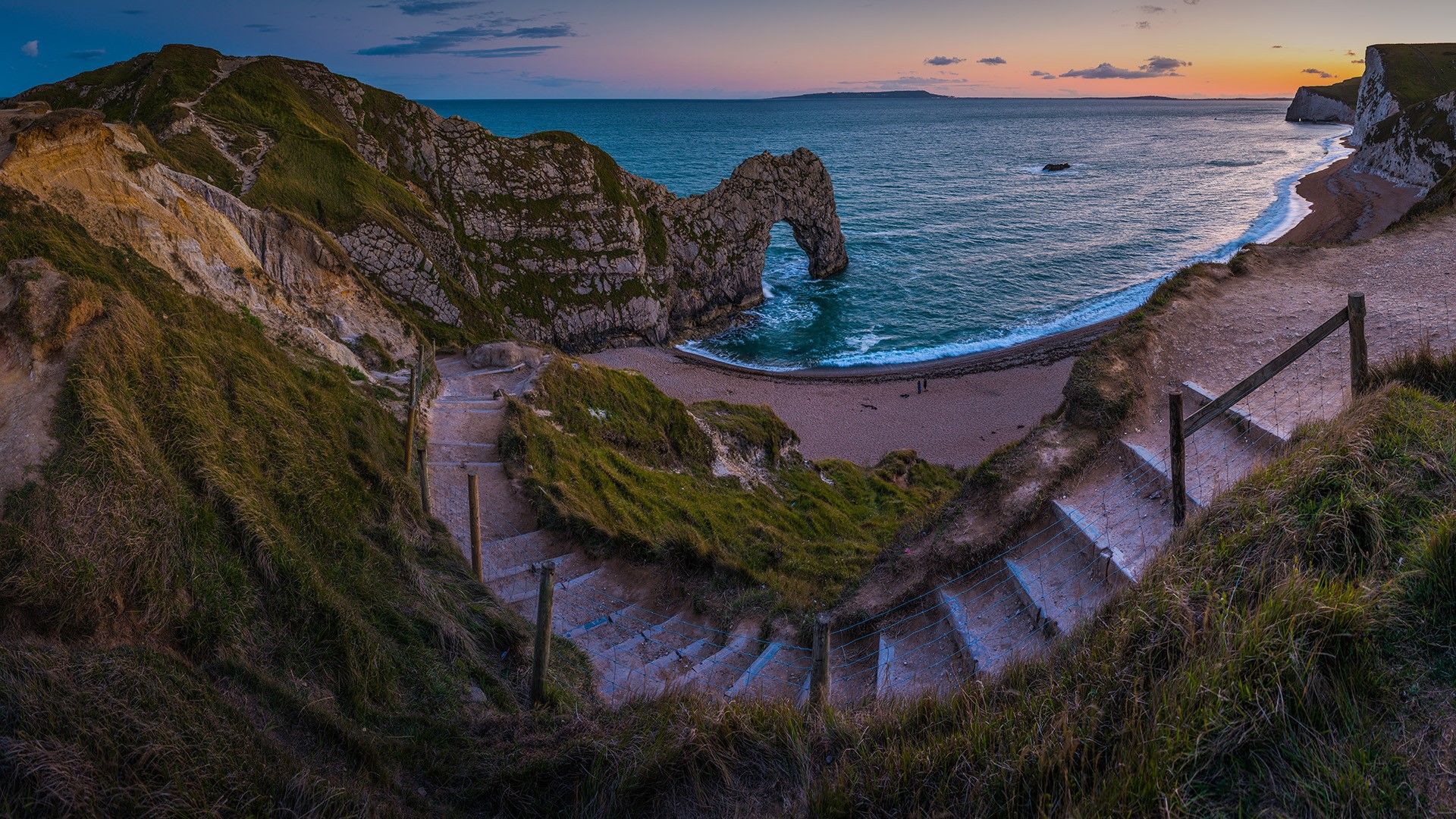 1920x1080 Beach path to ocean seaside cove Durdle Door, Jurassic Coast, Dorset, England, UK. Windows Spotlight Image