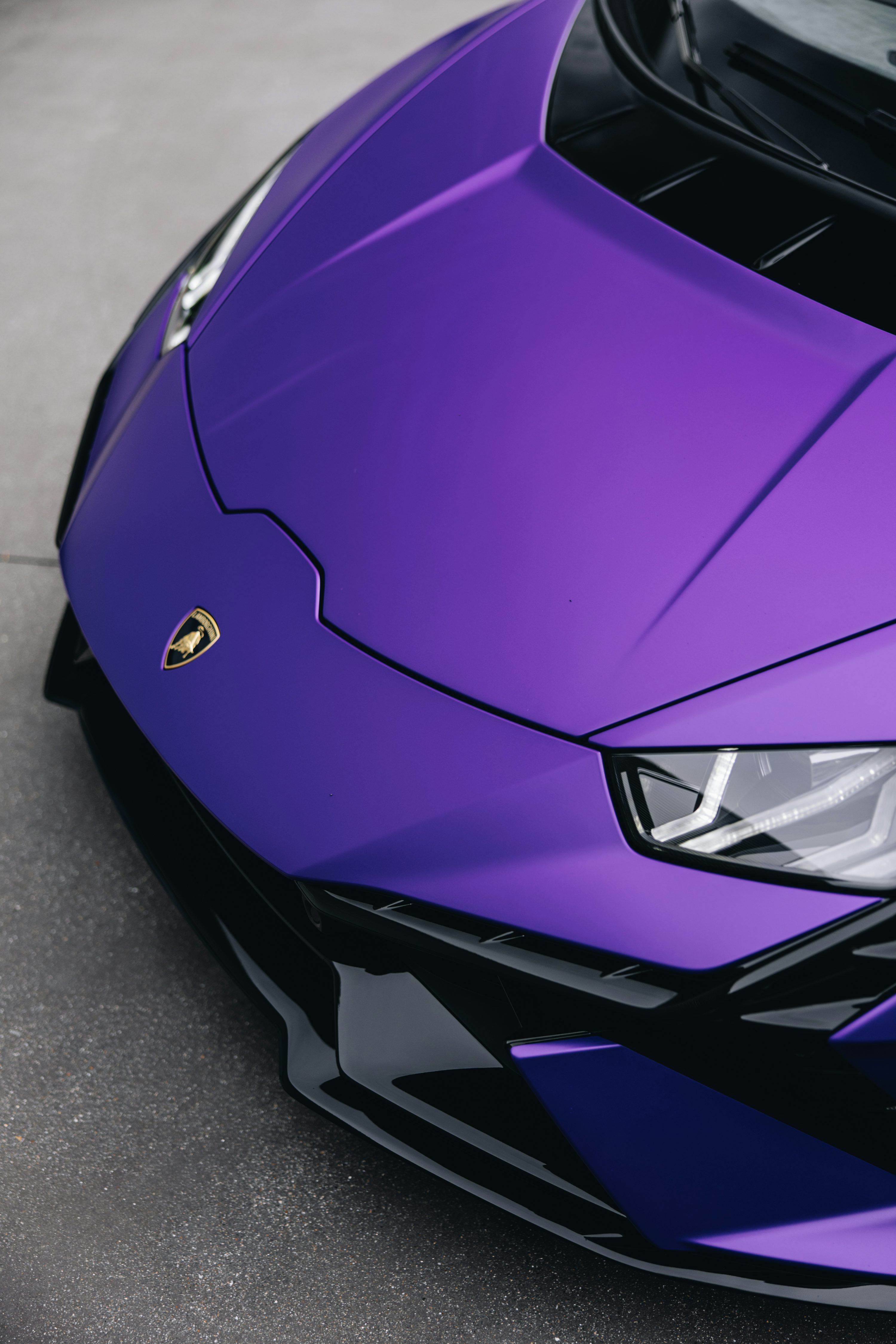 3000x4500 A close up of a purple sports car photo