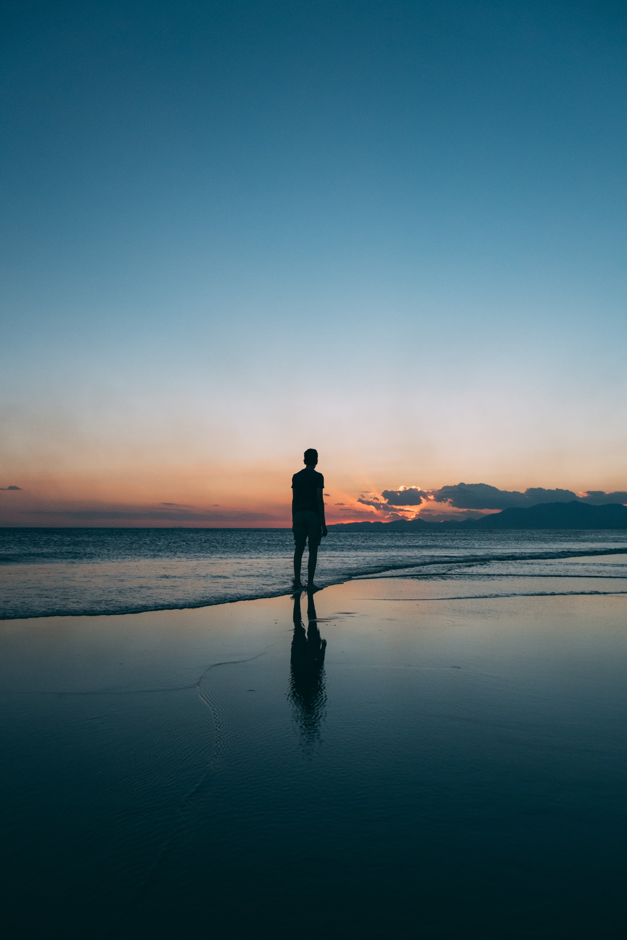 2624x3936 Men's grey shorts, Man, Silhouette, Sea HD wallpaper