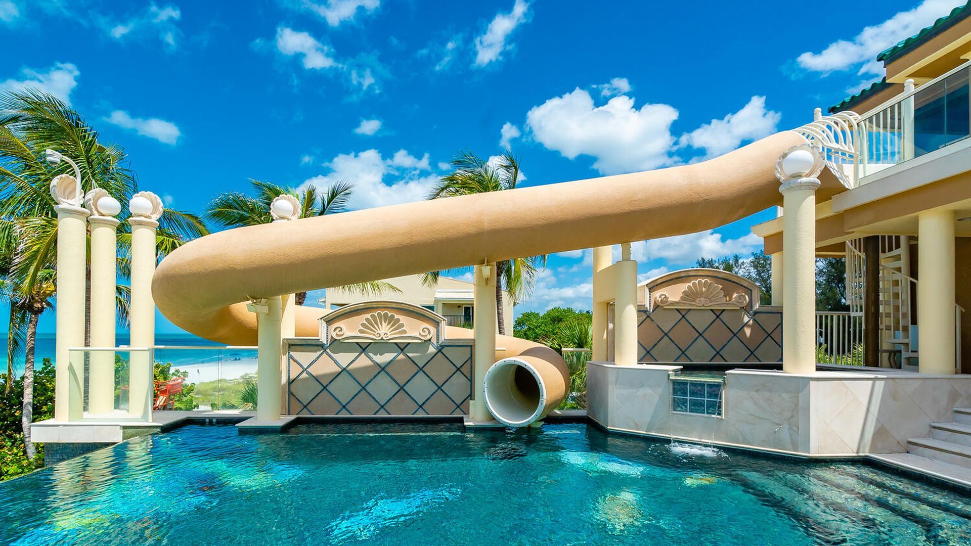 1920x1080 Sarasota retro beachfront mansion with a waterslide asks $12.9M Tampa Bay