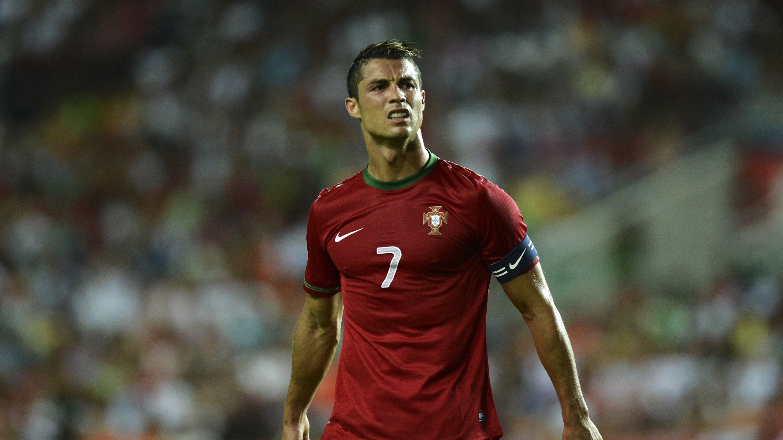 2560x1440 Sad Face Of Cristiano Ronaldo In Blur Background HD Ronaldo Wallpaper