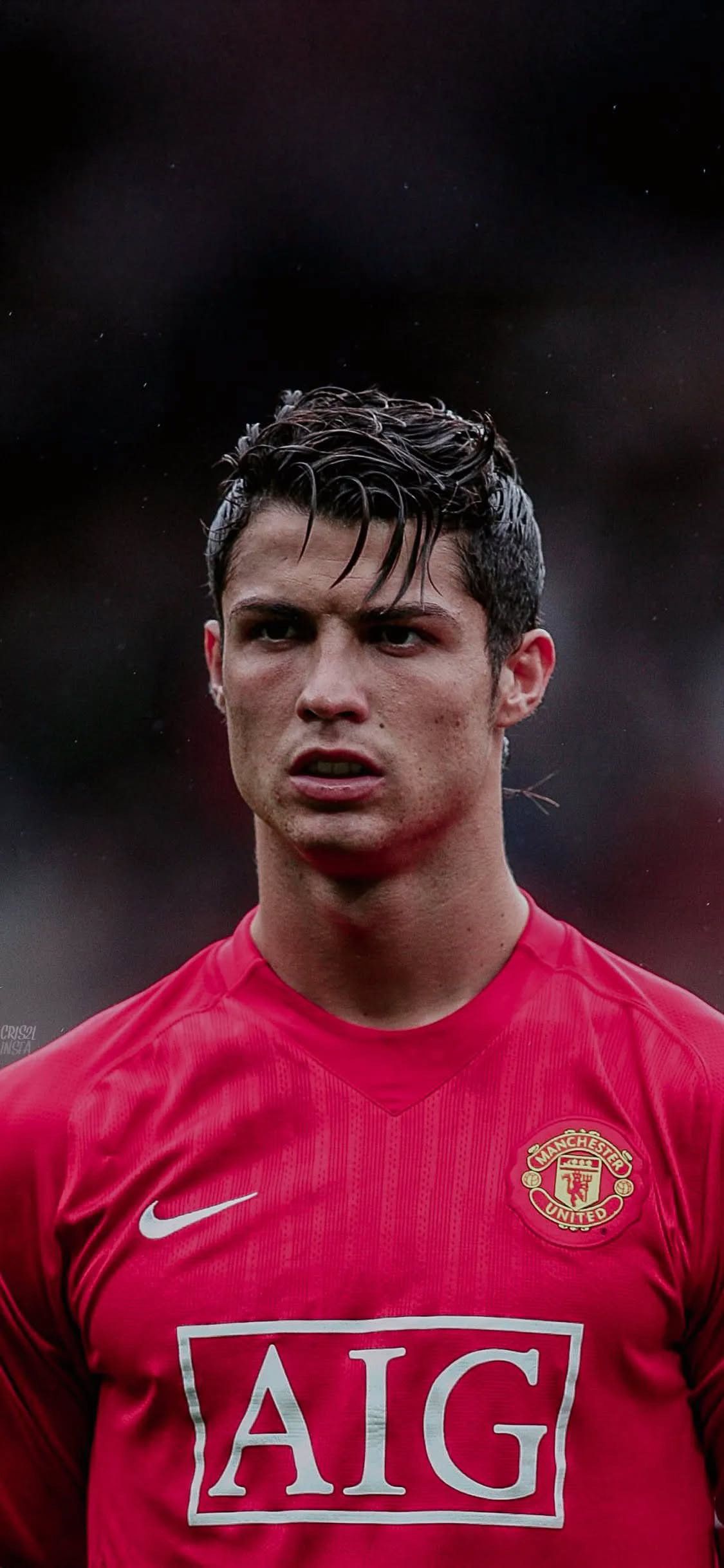 1125x2436 Young Cristiano Ronaldo at Manchester United Football Wallpaper
