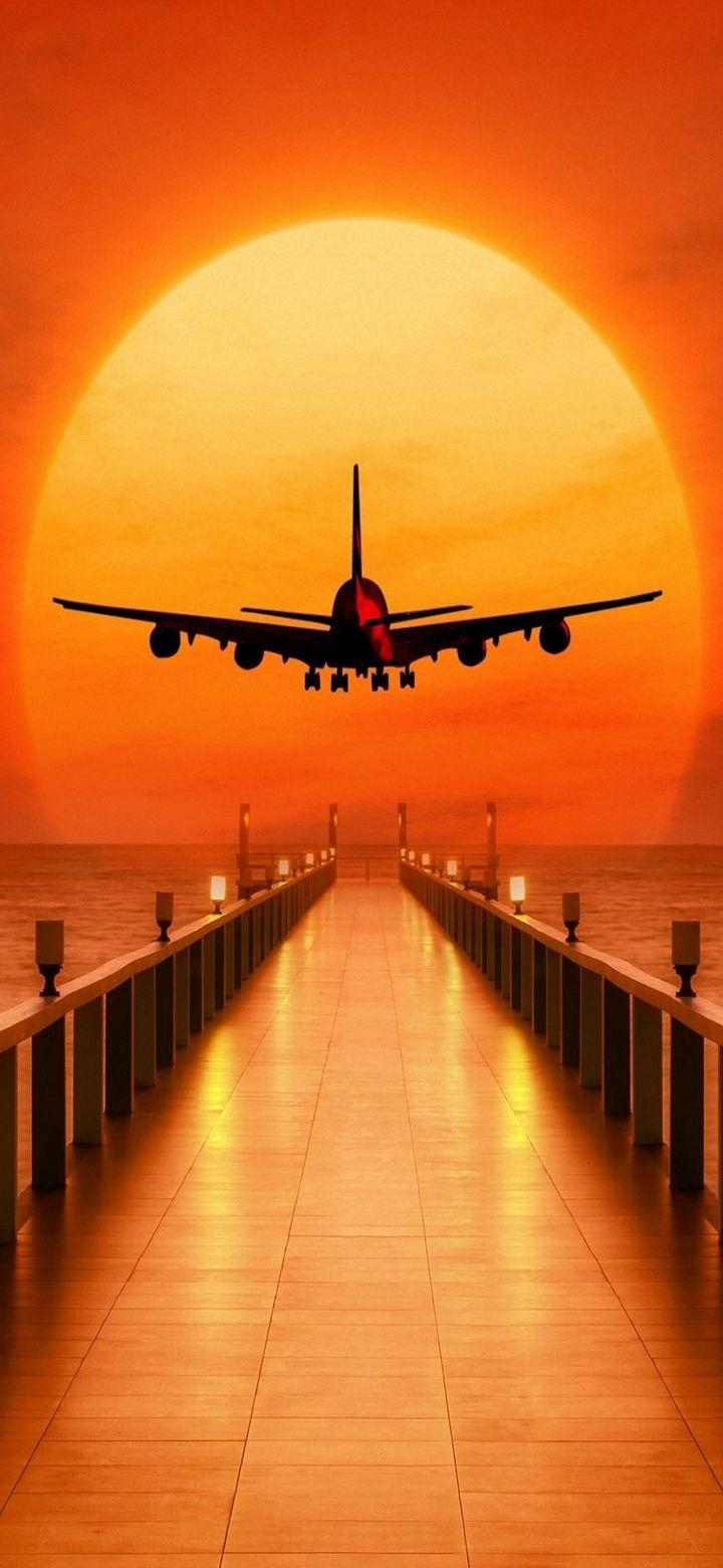 720x1560 Airplane Sunset Phone Wallpaper