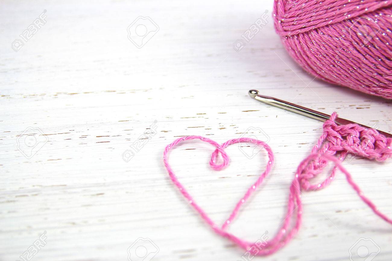 1300x866 Free download Pink Crochet Background With Yarn Heart On White