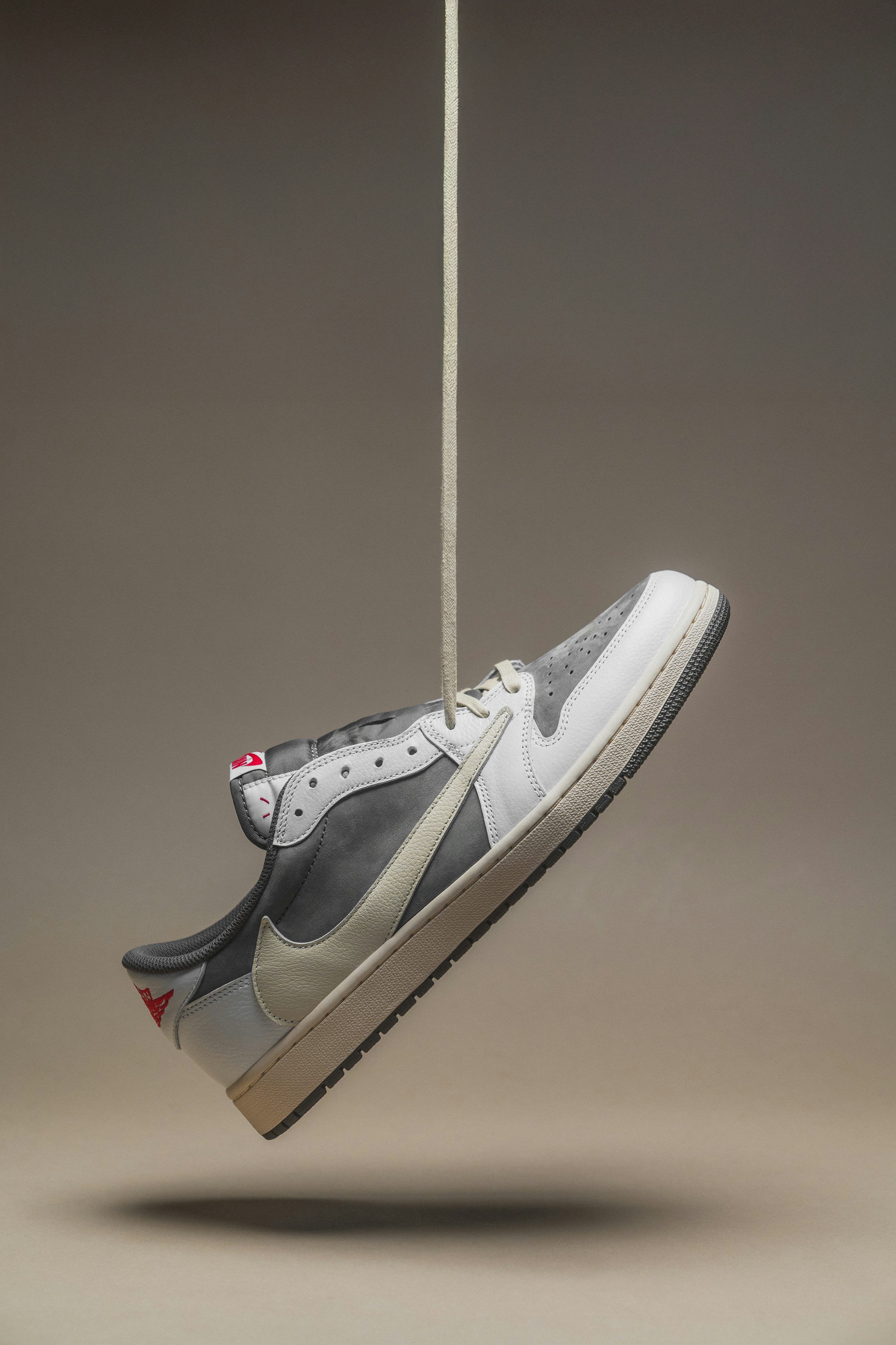 3000x4500 A sneaker is suspended in the air. photo