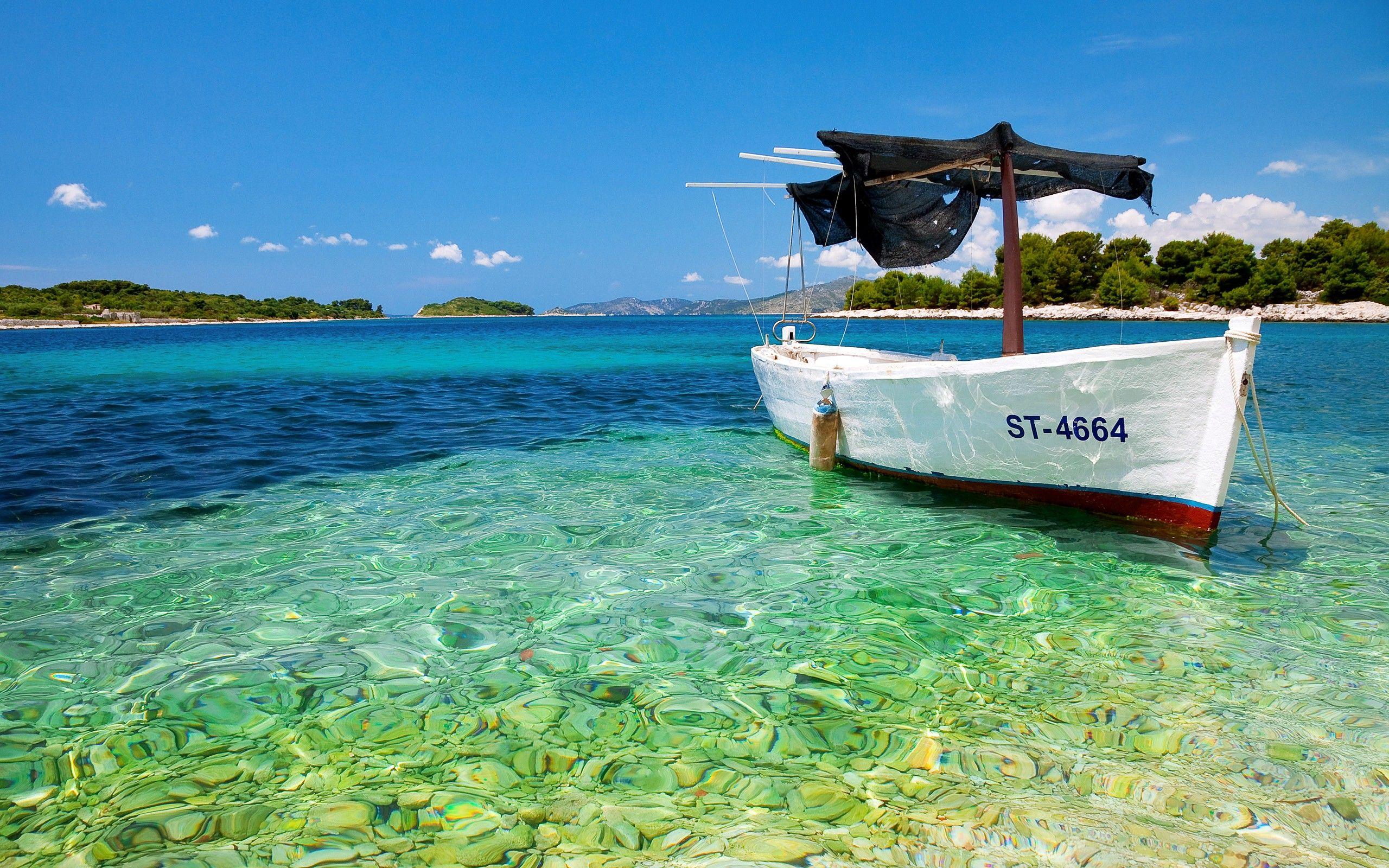2560x1600 Download 2560x1600 Boat on Beautiful Transparent Water River