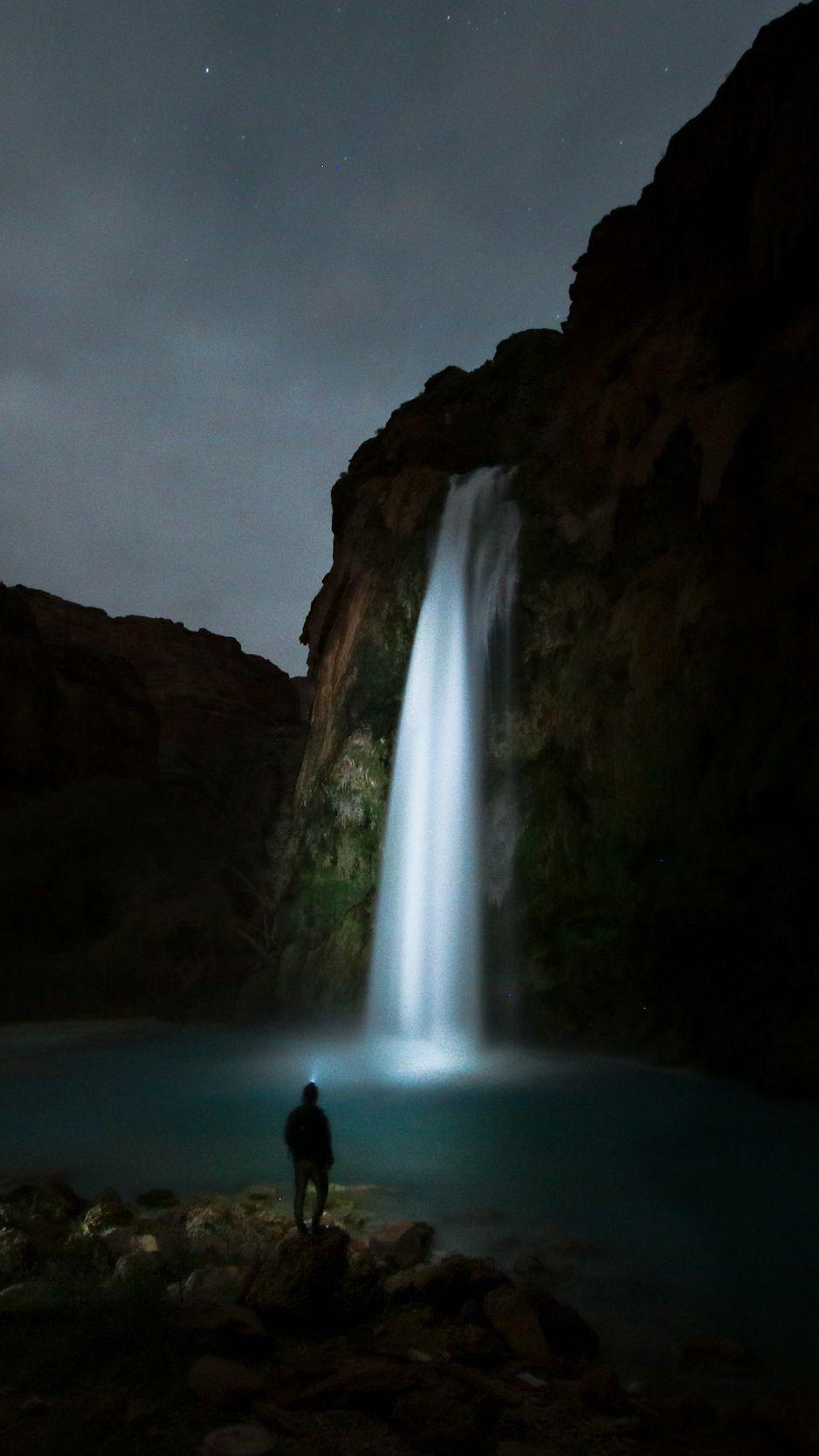 938x1668 Download wallpaper 938x1668 waterfall, night, man, river iphone 8