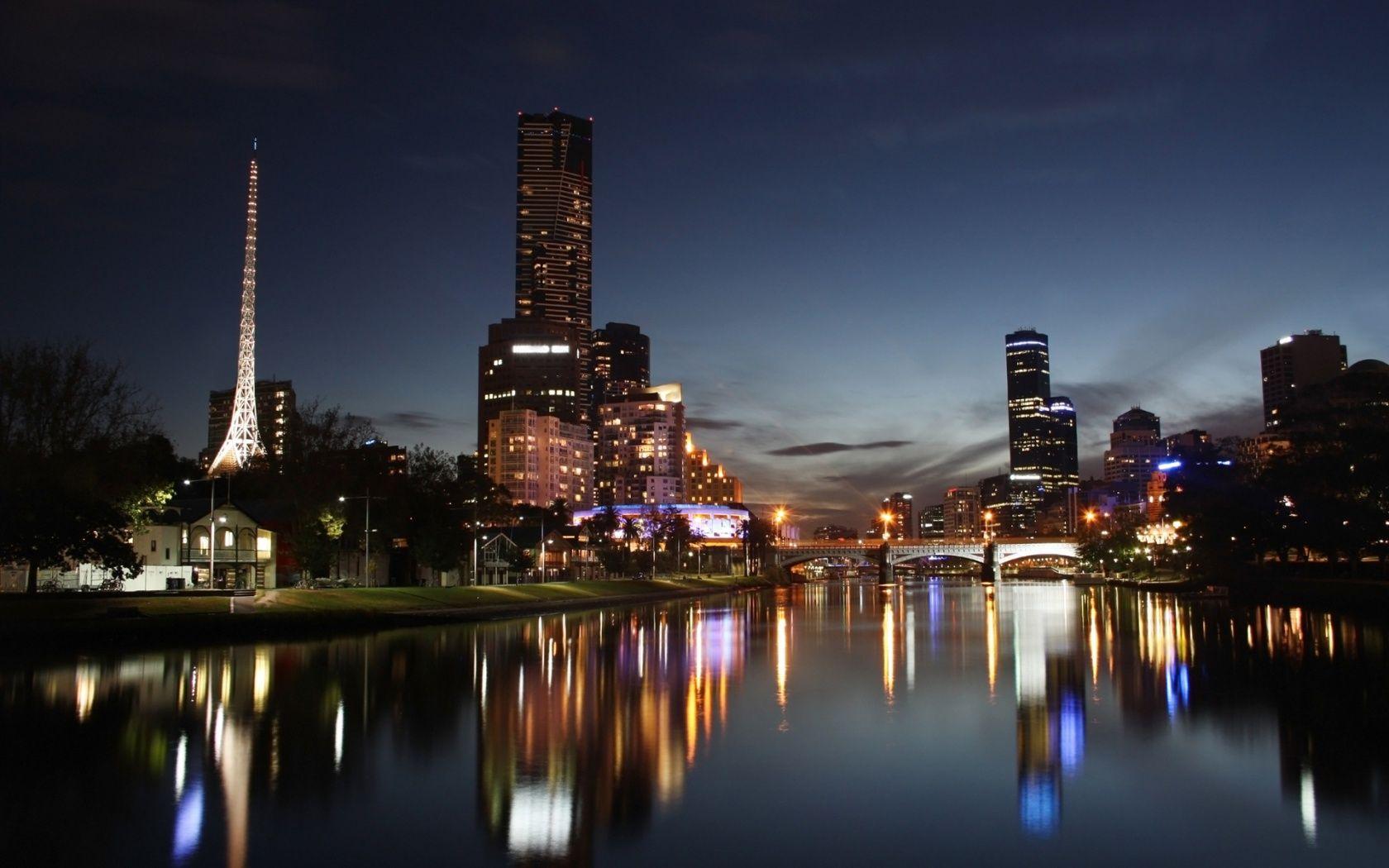 1680x1050 City Night River Reflection Wallpaper
