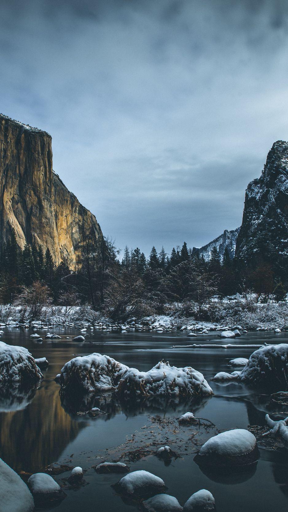 938x1668 Download wallpaper 938x1668 river, mountains, stones, shore, trees