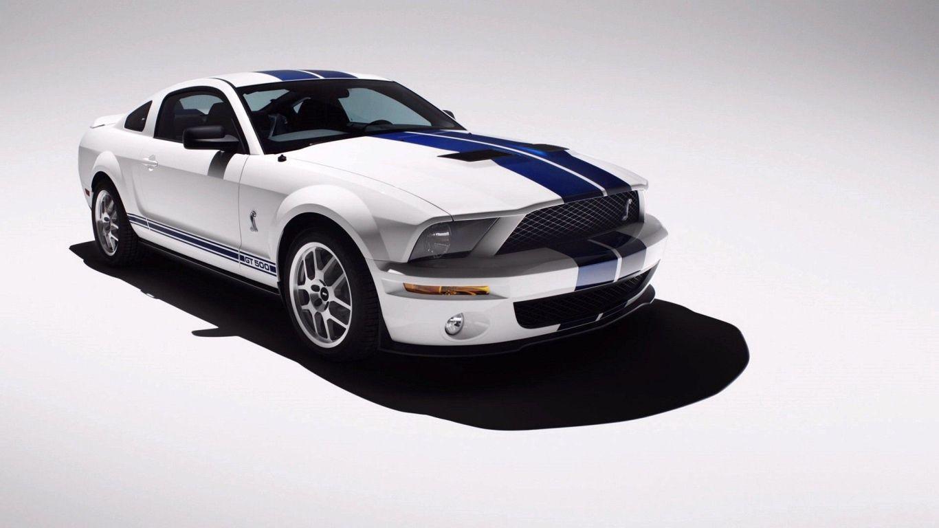 1366x768 White Mustang with blue stripes on the body Desktop wallpaper