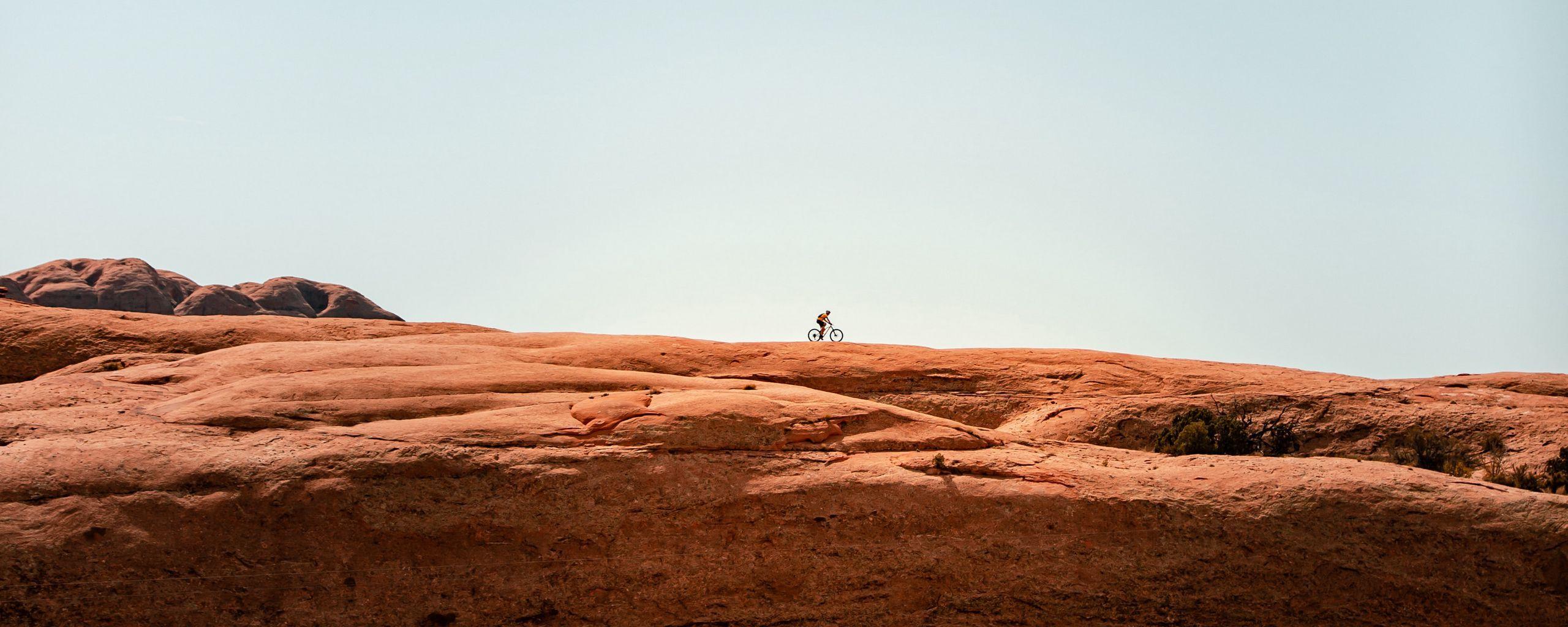 2560x1024 Download wallpaper 2560x1024 rock, stone, silhouette, minimalism