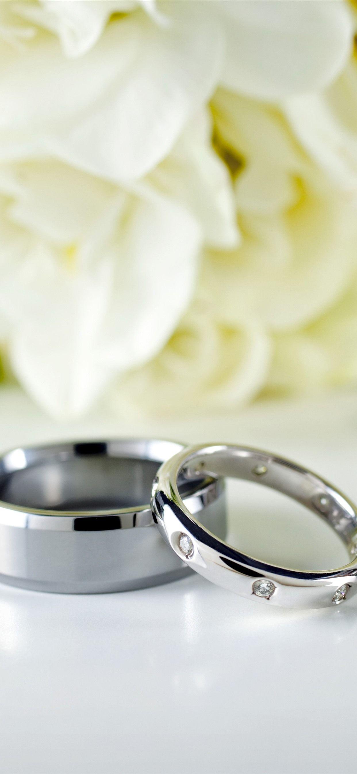 1242x2688 Wedding Rings, Flowers Background 1242x2688 IPhone 11 Pro XS Max