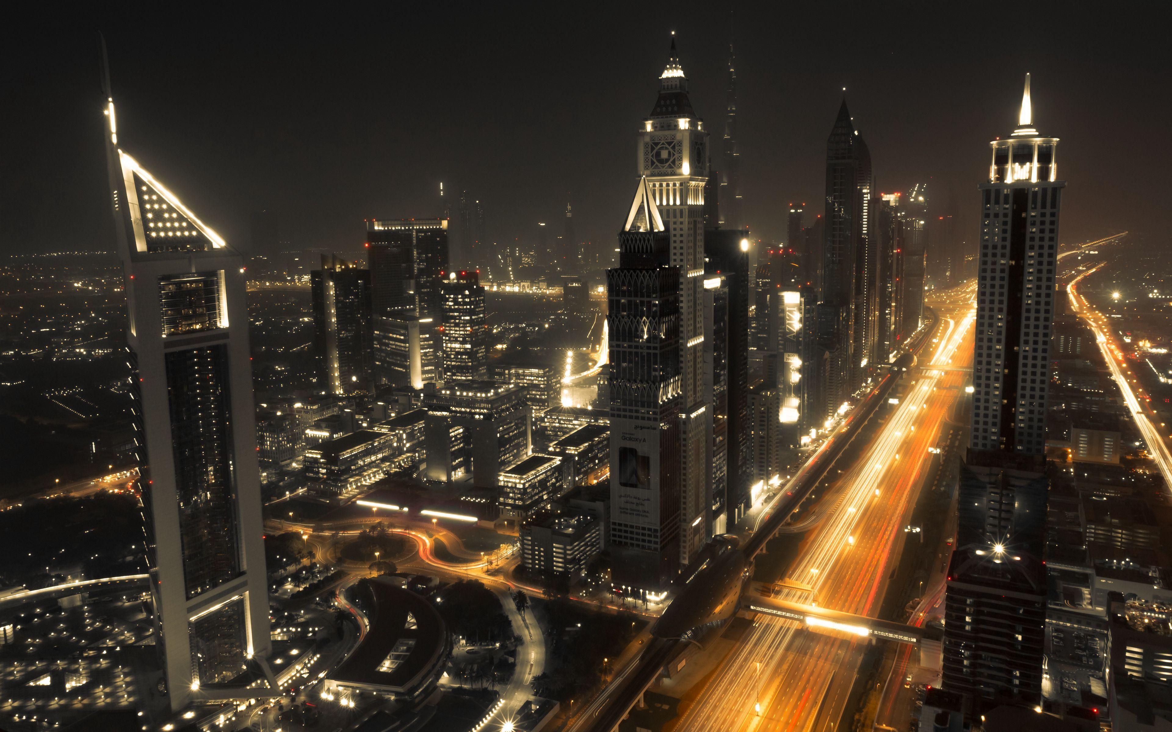 3840x2400 Download wallpaper 3840x2400 dubai, architecture, buildings, night