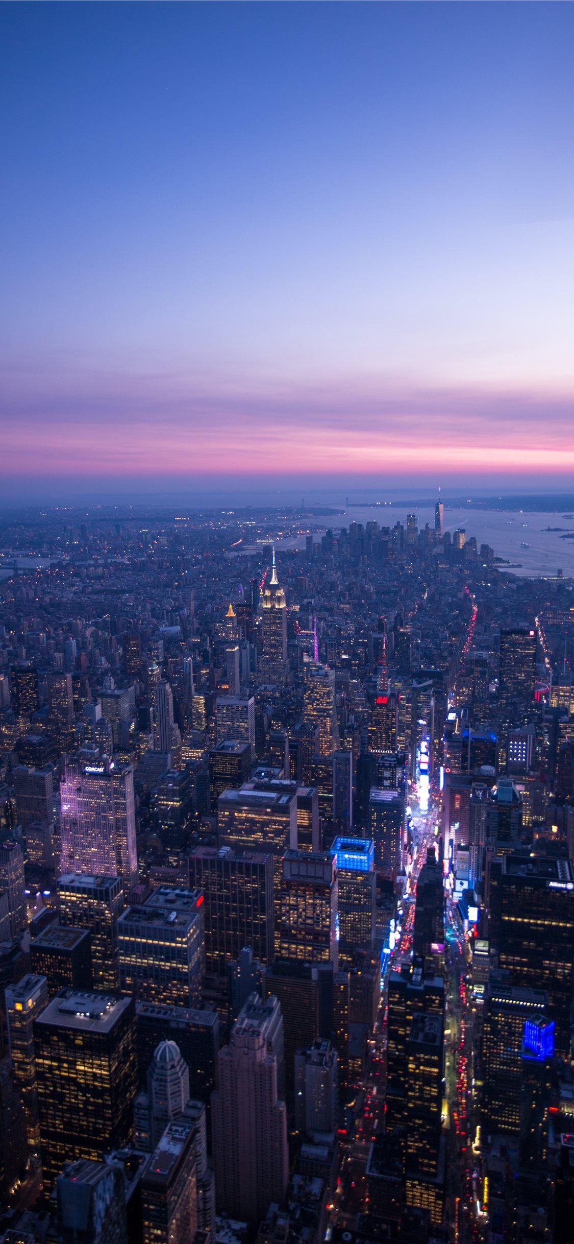 1125x2436 Sunset in Manhattan iPhone Wallpaper Free Download