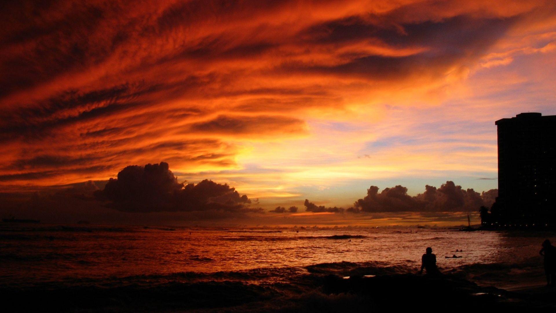 1920x1080 Red Sunset with Cloudy Sky over Beach