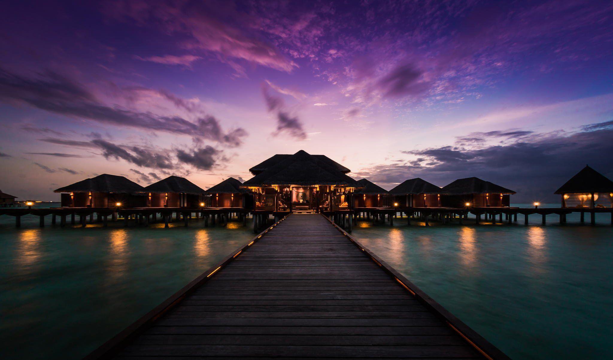 2048x1204 Anantara veli resort and spa maldives sunset pier wallpaper
