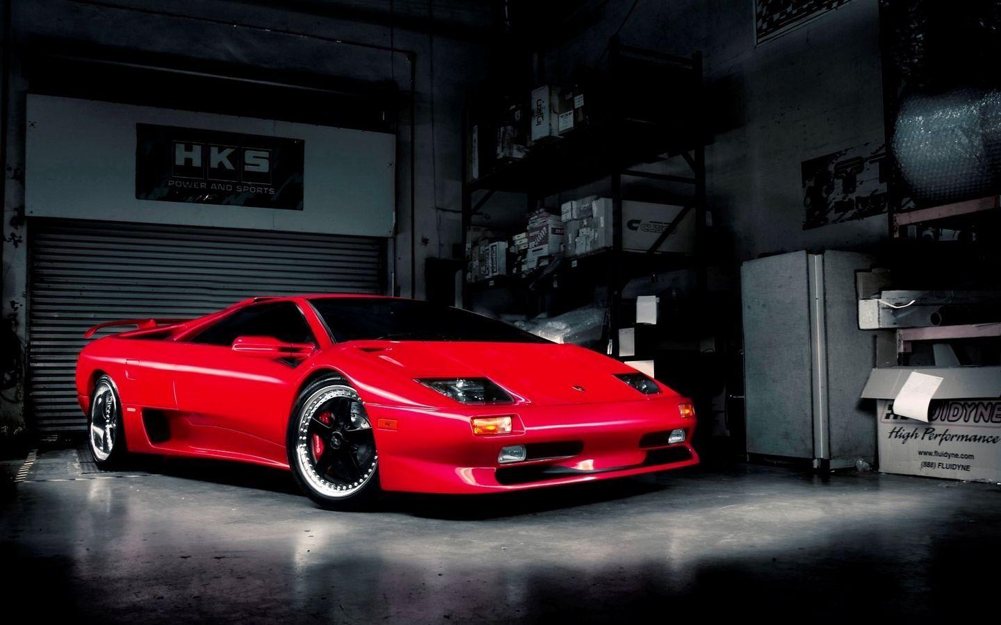 1440x900 Download wallpaper 1440x900 red, garage, car, lamborghini