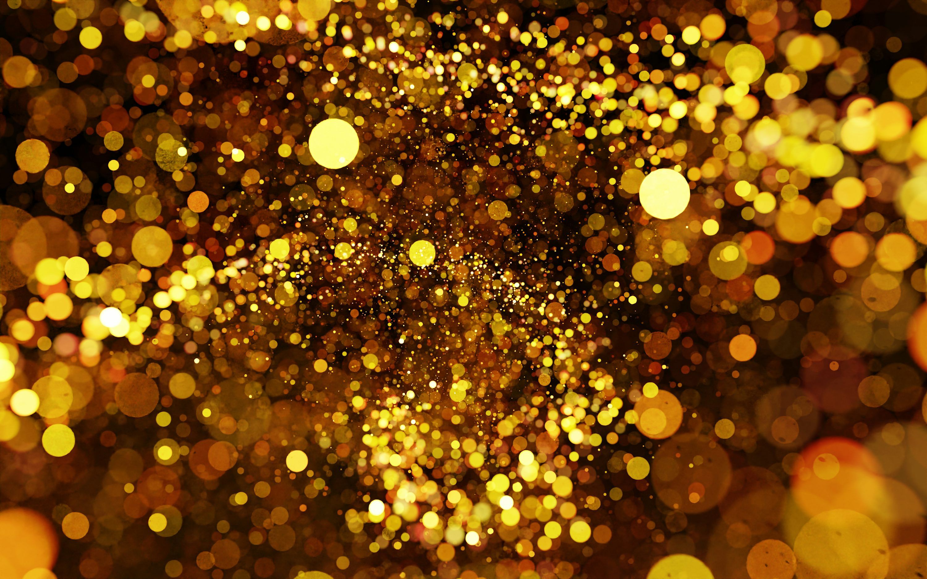3000x1875 A blurry image of a gold glitter background photo