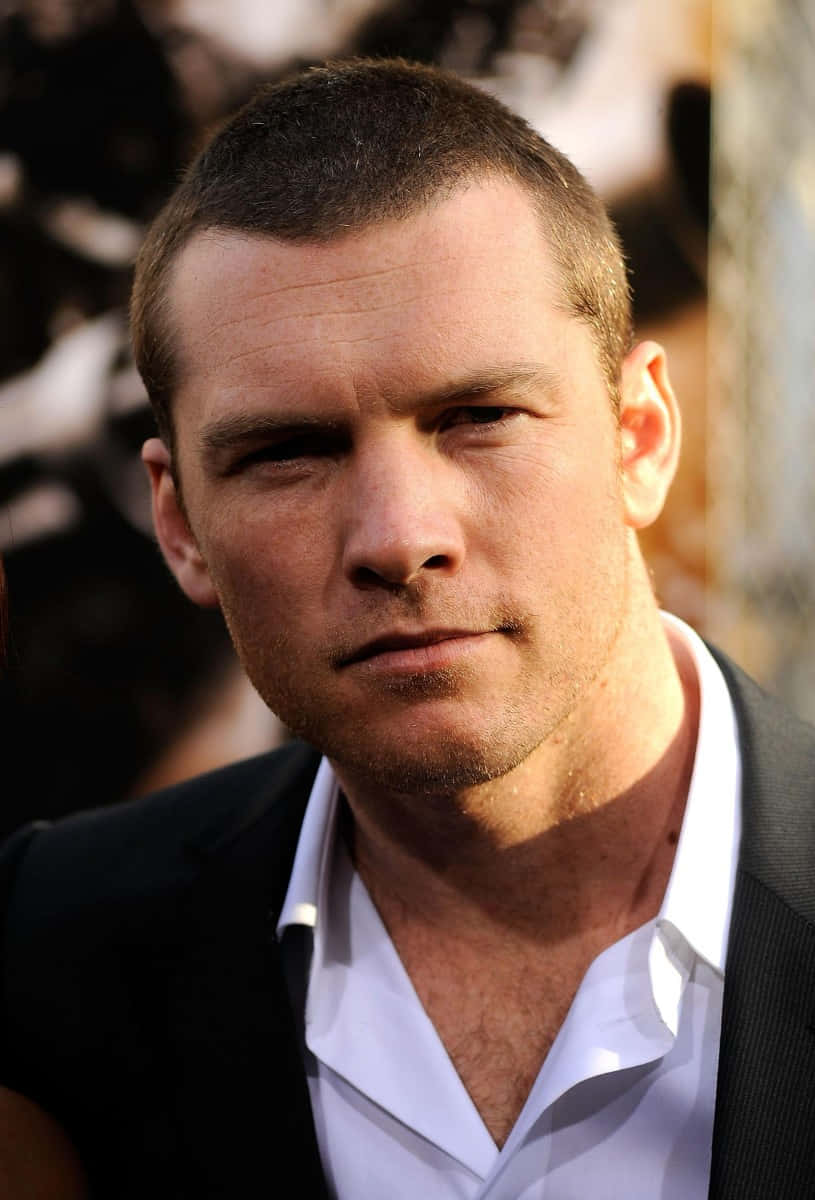 815x1200 Download Sam Worthington Handsome Candid Photography Wallpaper
