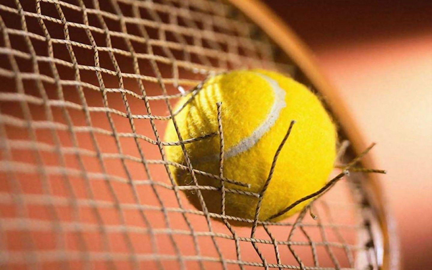 1440x900 Tennis ball and racket Wallpaperx900