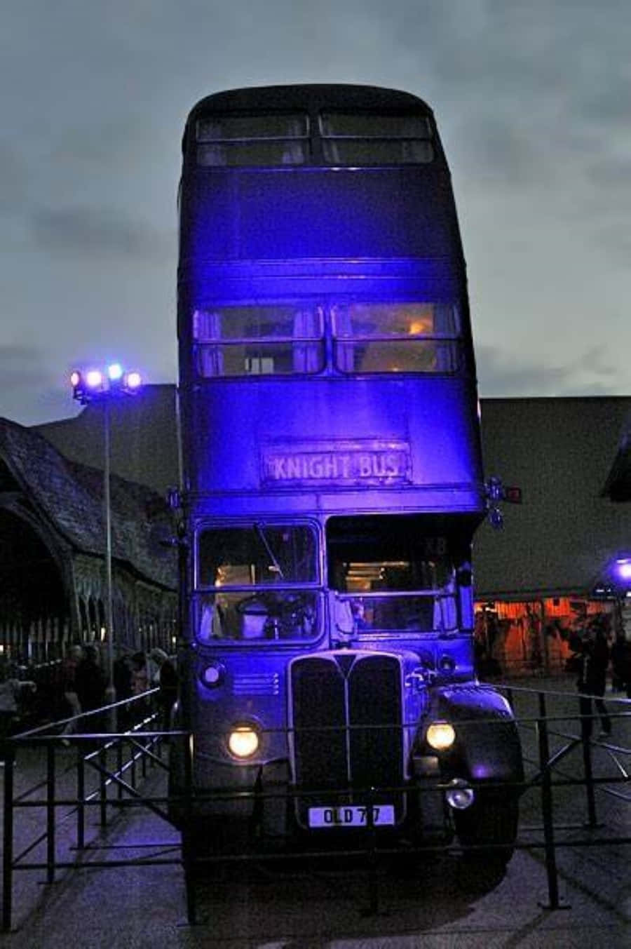 900x1353 Download A magical journey awaits at the Hogwarts Knight Bus Stop Wallpaper