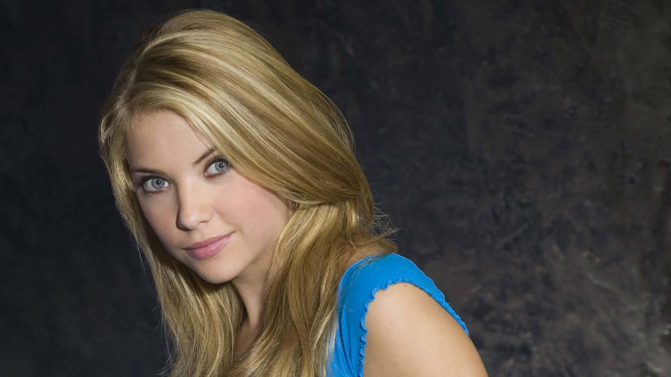 2560x1440 Download Indiana Evans Radiant Smile Wallpaper