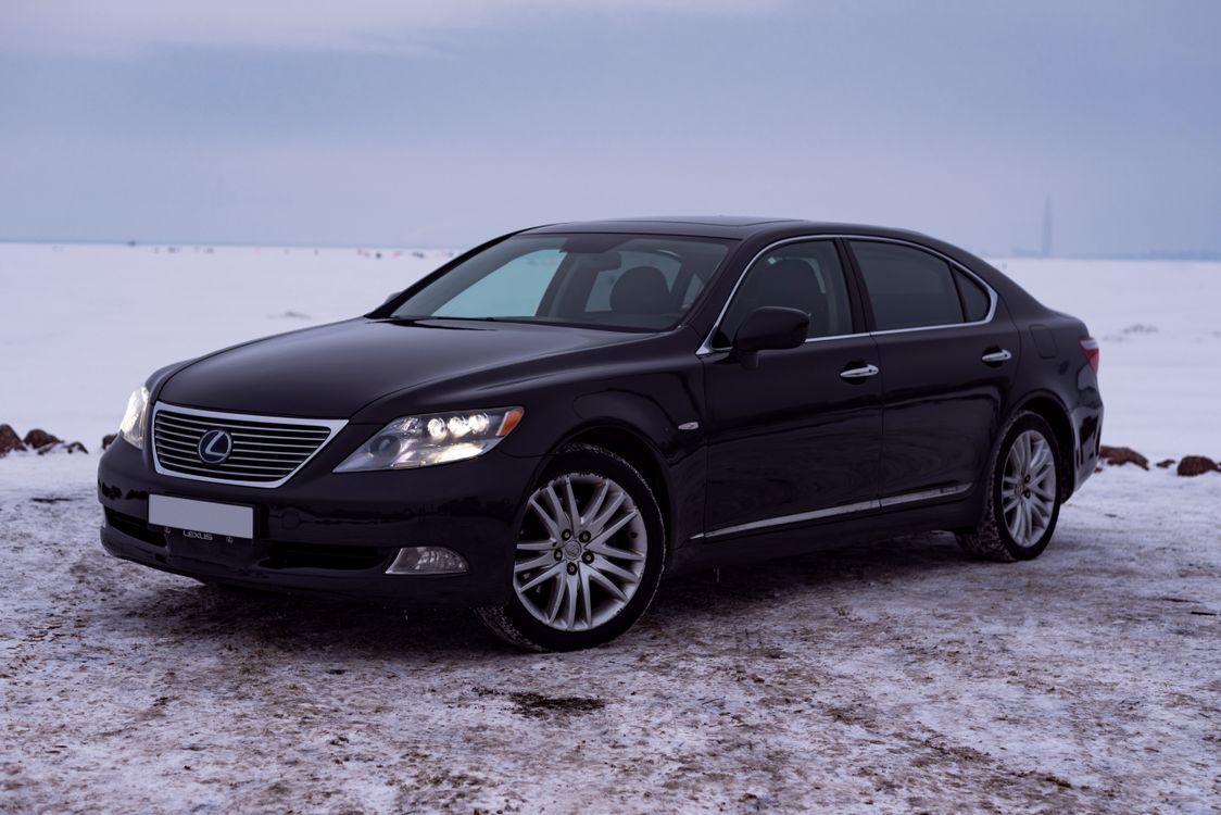1124x750 Black Lexus LS 460 Car Parked near a Snow Field · Free