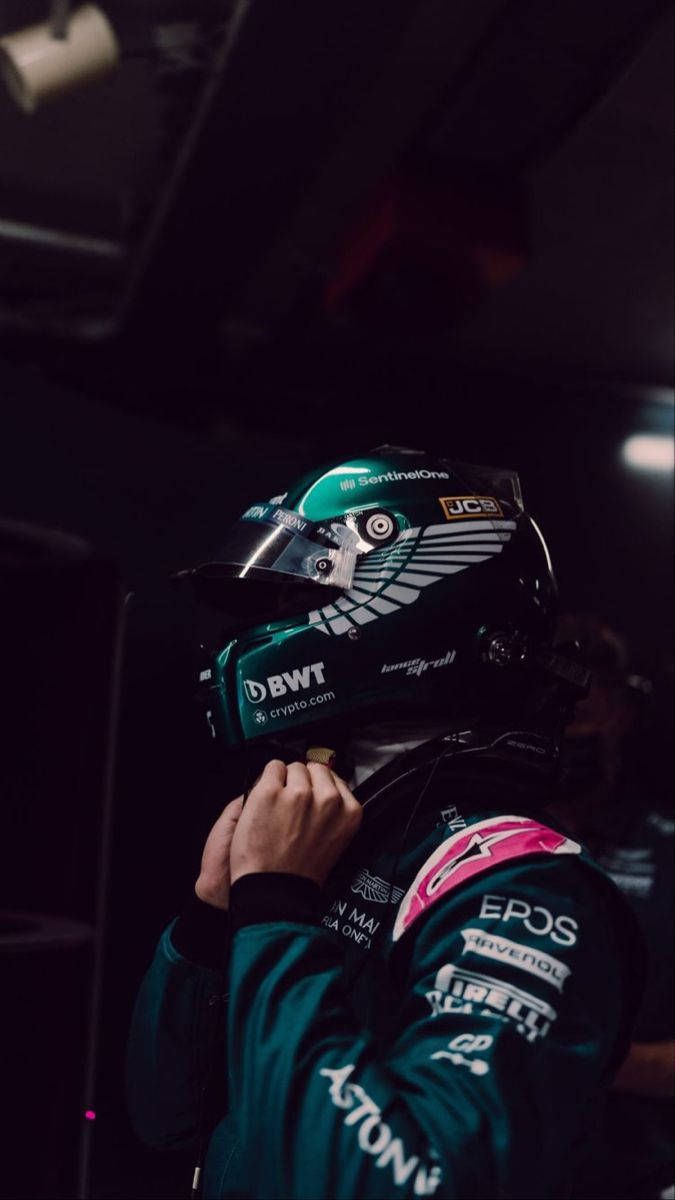 675x1200 Download Lance Stroll Fixing His Racing Overalls Wallpaper