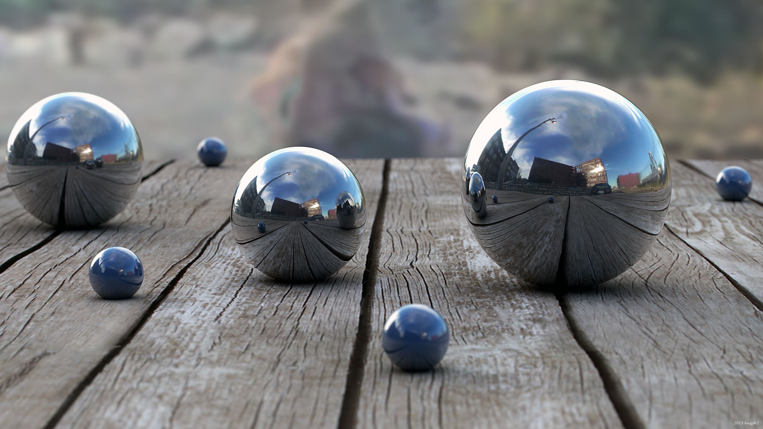 2560x1440 Reflections in Focus: HD Photography of Shiny Spheres on Rustic Woodx1440