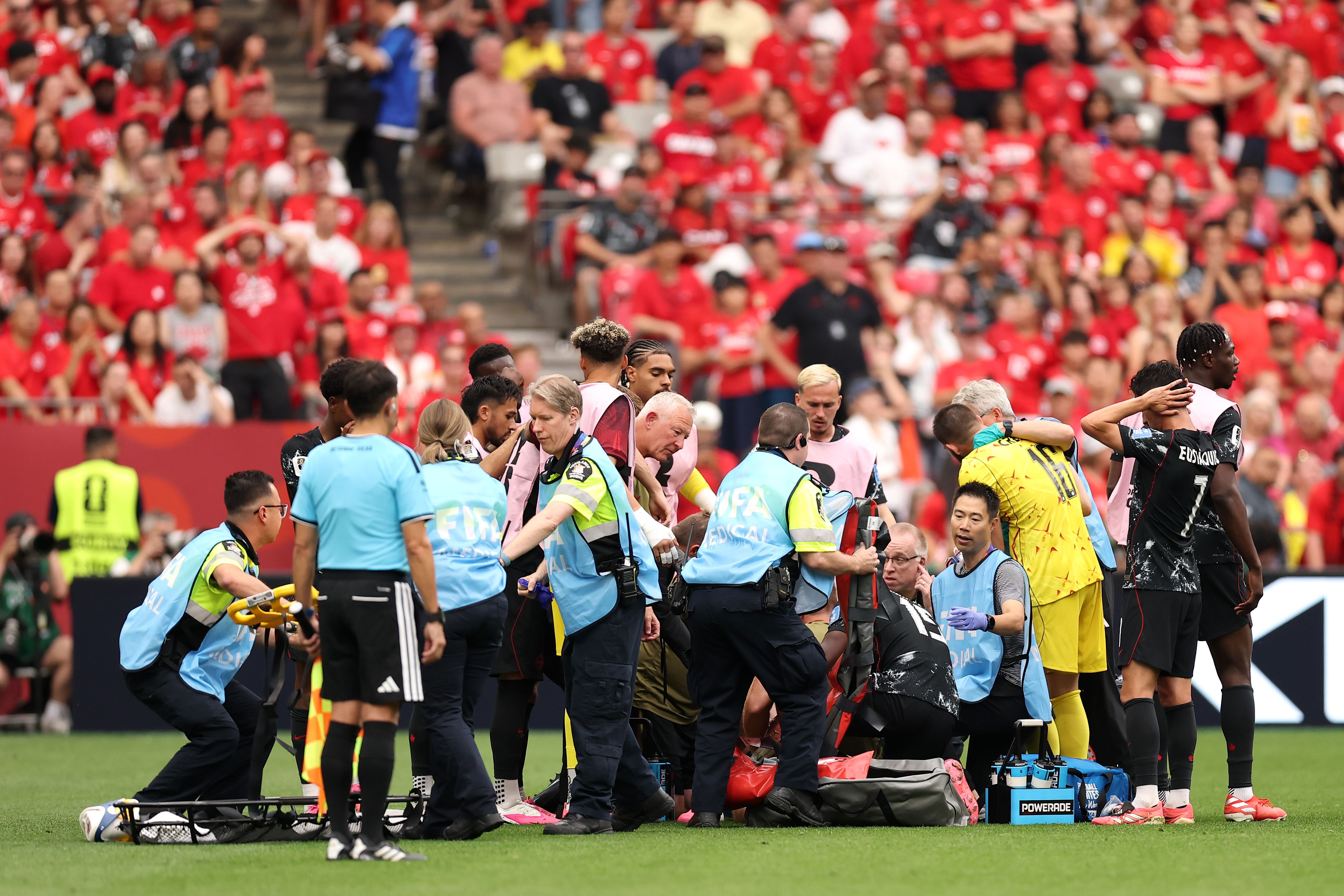 4385x2924 Canada star Ismael Kone suffers horror injury in World Cup match as Qatar reduced to nine men
