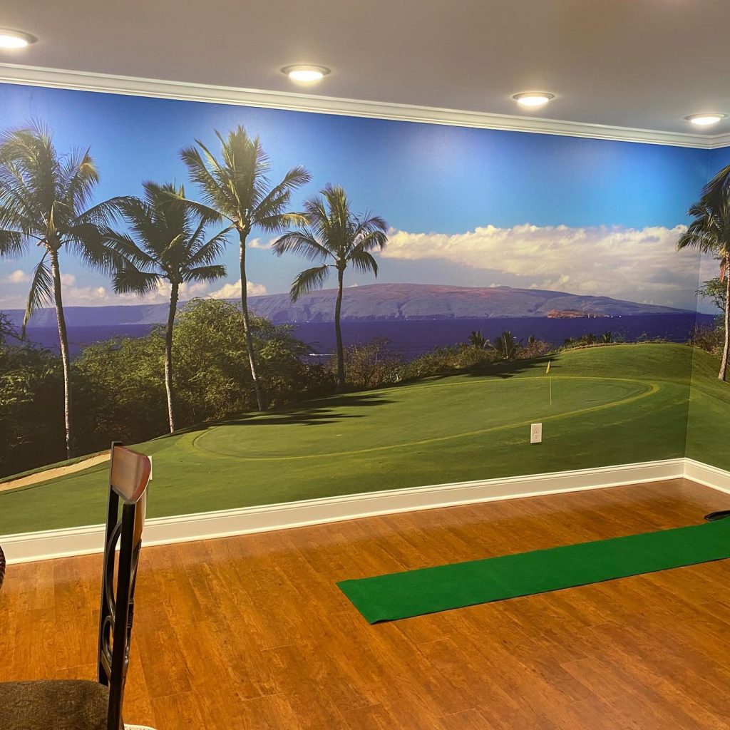 1024x1024 Tropical golf course wallpaper in a man cave with putting green