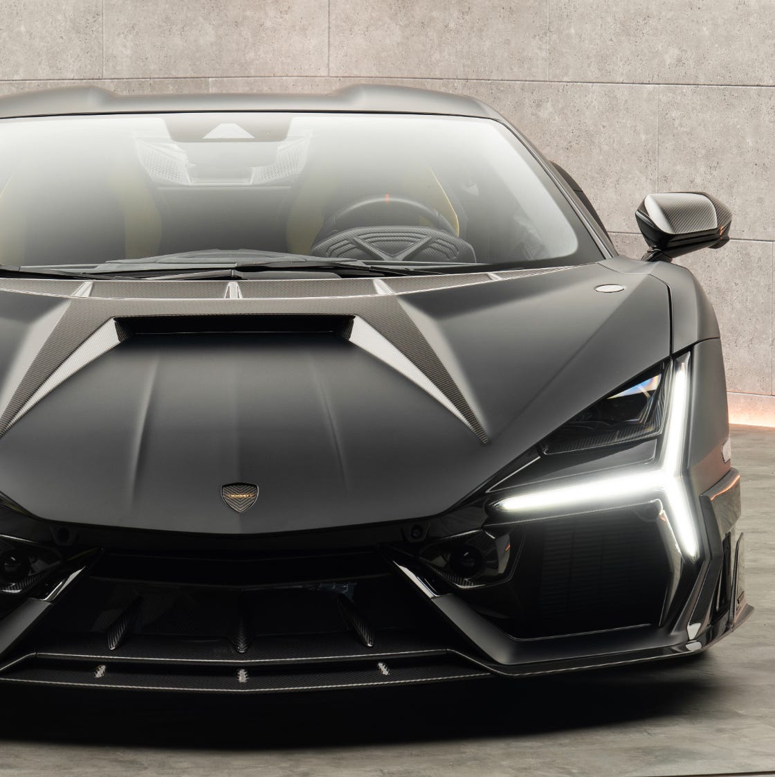 1120x1122 Mansory's Latest Creation: This Blacked Out Lamborghini Revuelto