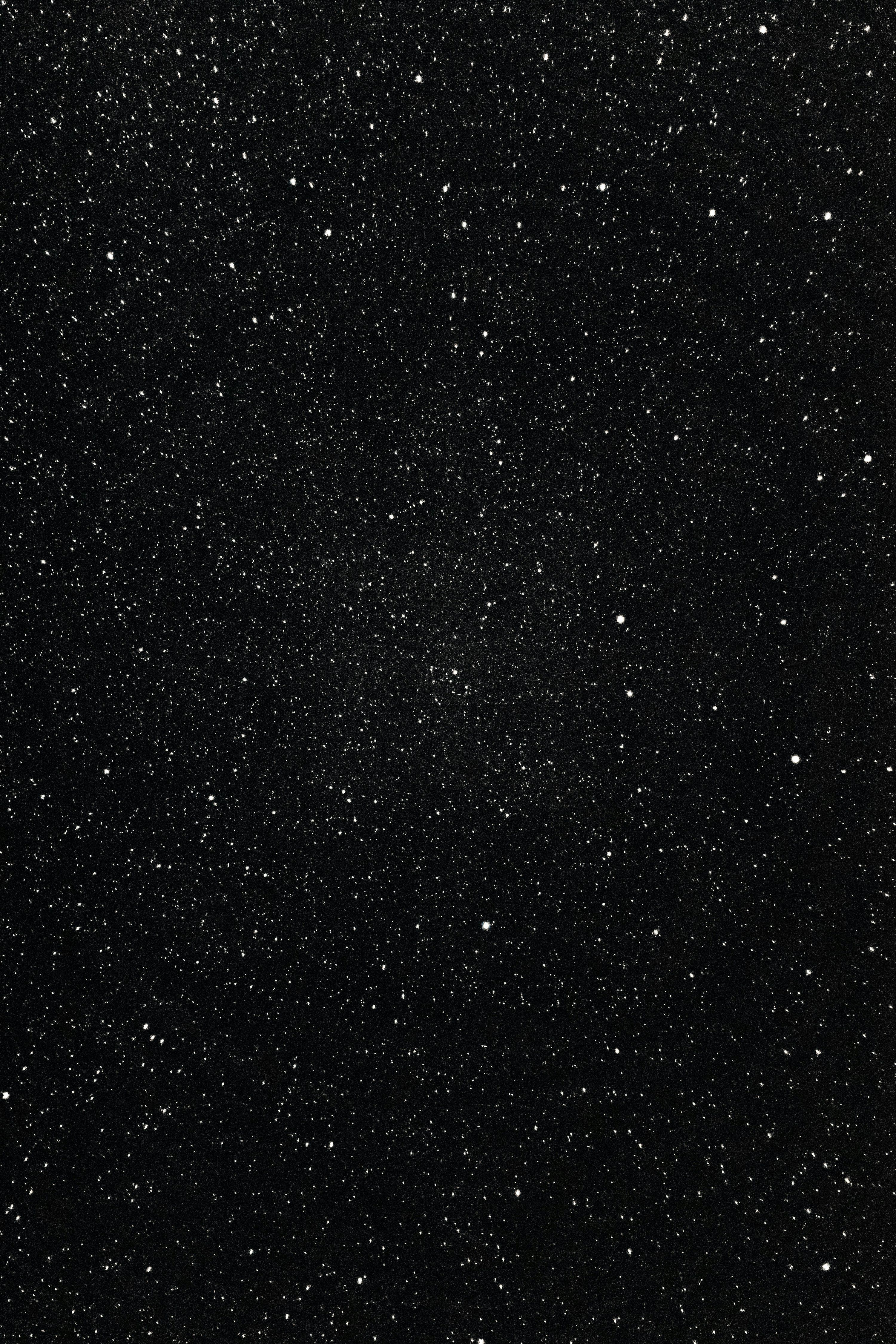 3000x4500 A black and white photo of the night sky photo
