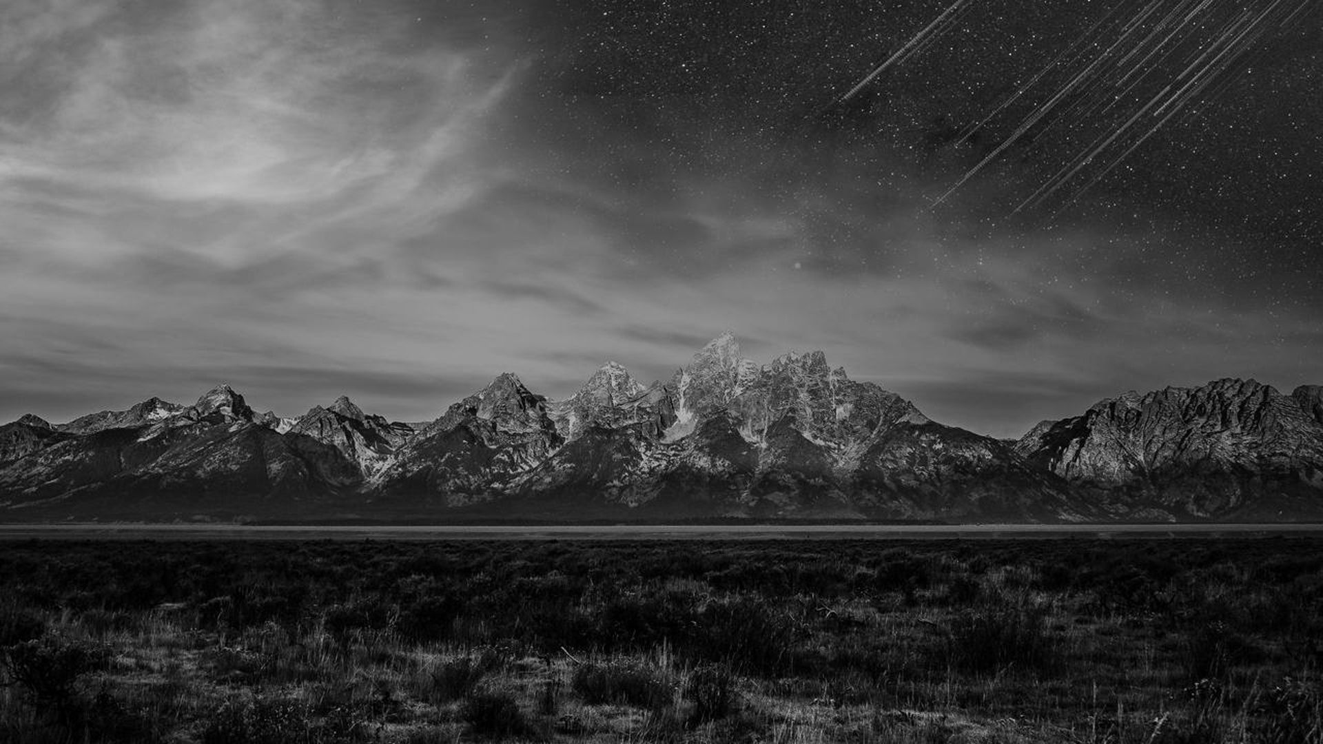 1920x1080 Mountain Under Falling Stars Black White Clouds Sky HD Dark Wallpaper