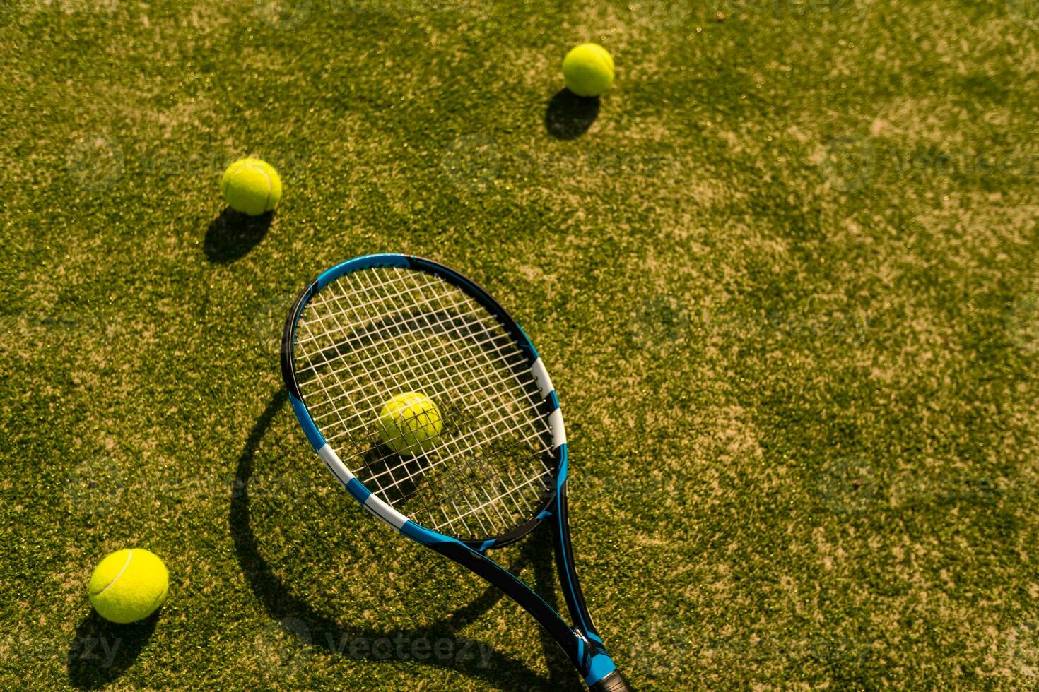 1470x980 View of empty lawn tennis court with tennis ball