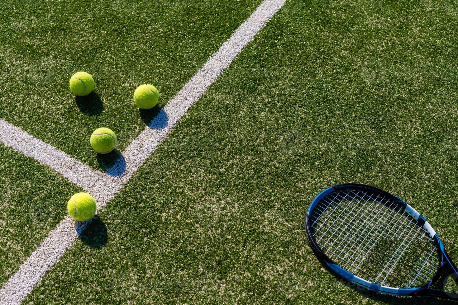 1470x980 View of empty lawn tennis court with tennis ball