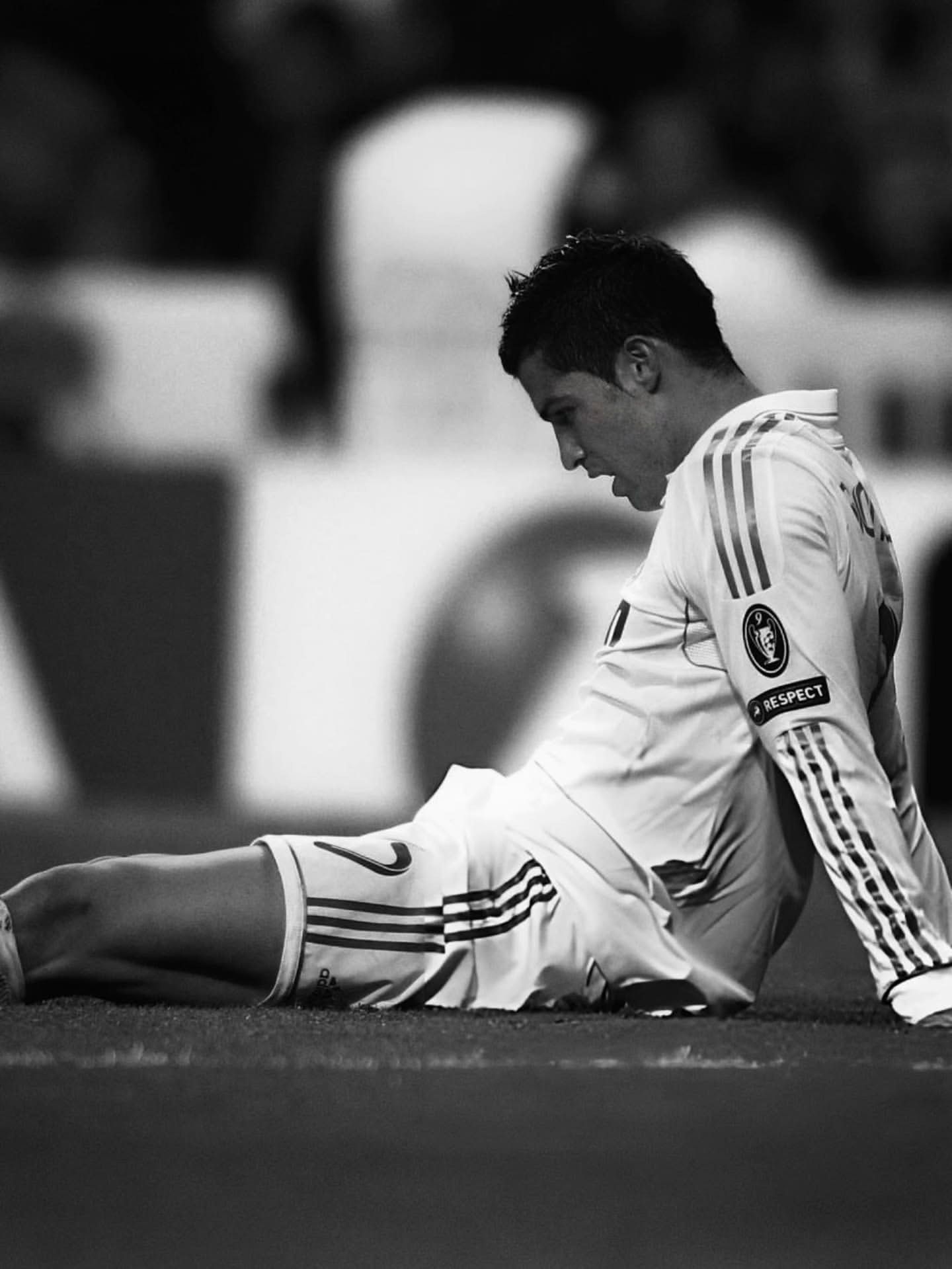 1440x1919 Cristiano Ronaldo sitting on pitch for Real Madrid Football Wallpaper