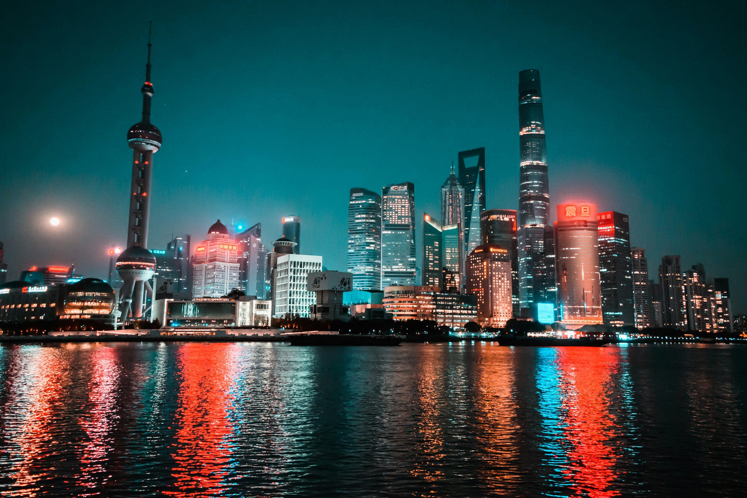 3000x2000 Nighttime skyline reflecting on the water. photo