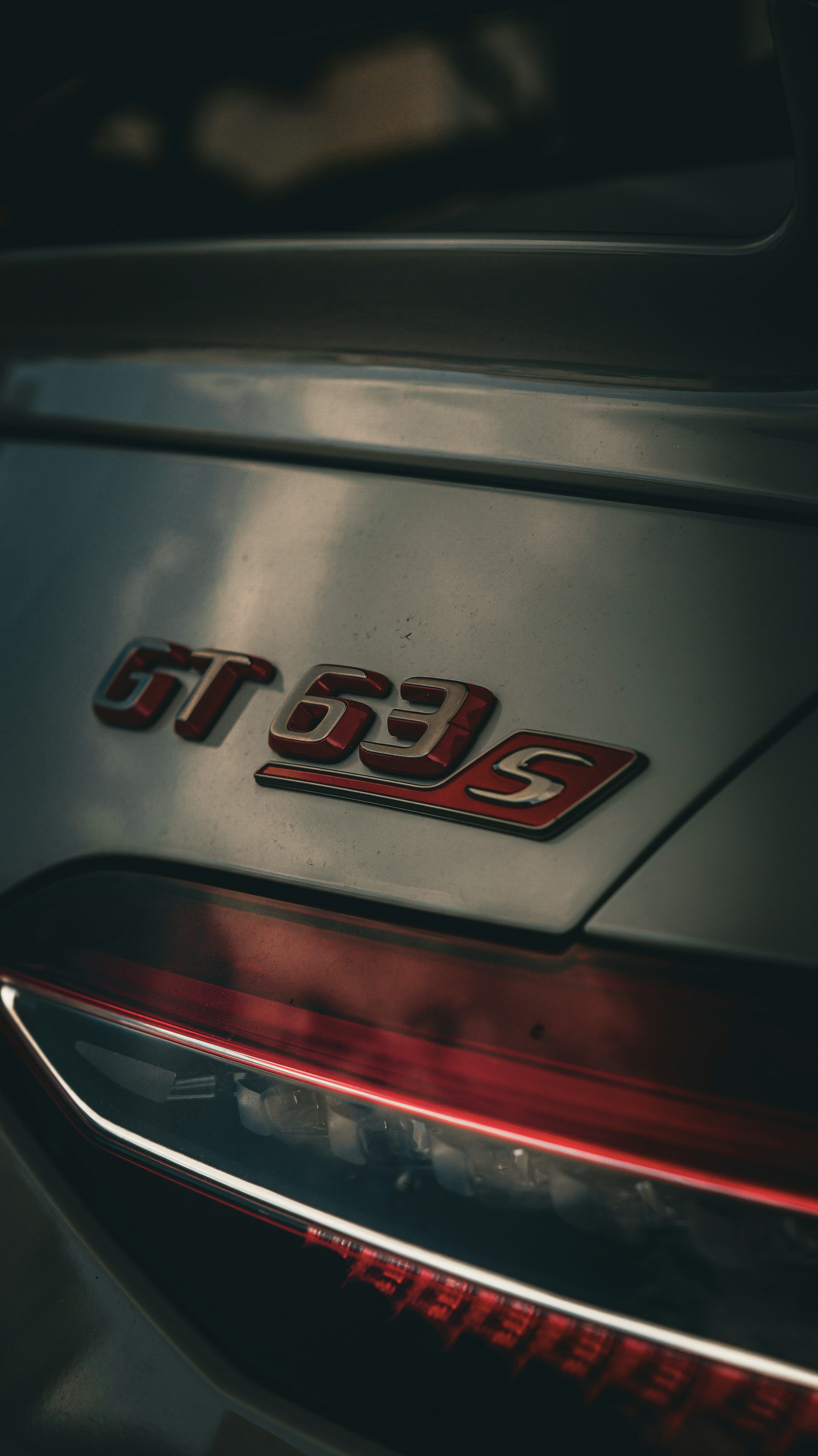 3000x5341 A close up of the tail light of a car photo