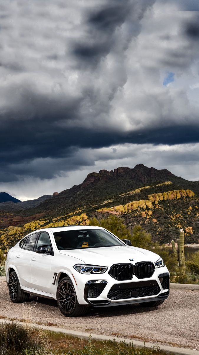 675x1200 BMW X5 Luxury Car with Mountain View. Bmw x6m f Bmw x6 aesthetic wallpaper, Bmw x6 wallpaper iphone