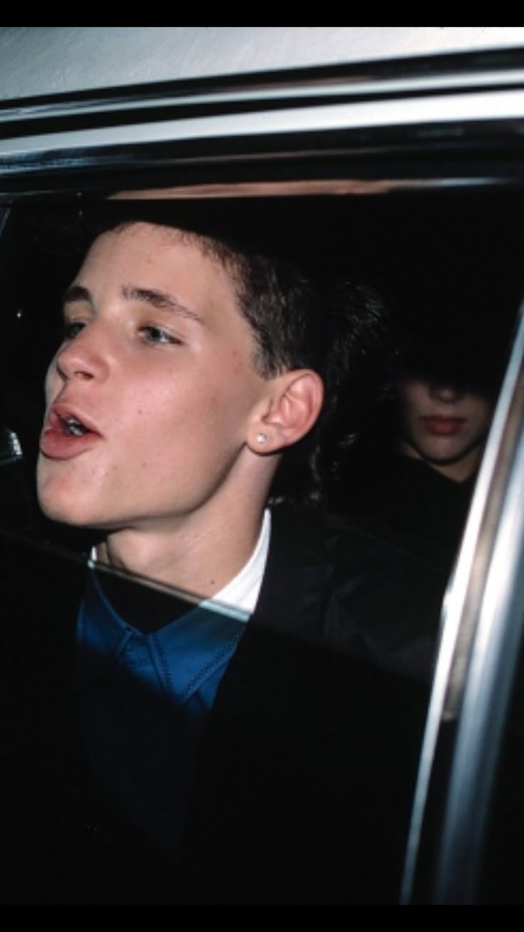 736x1308 Corey haim and Alyssa Milano in the background