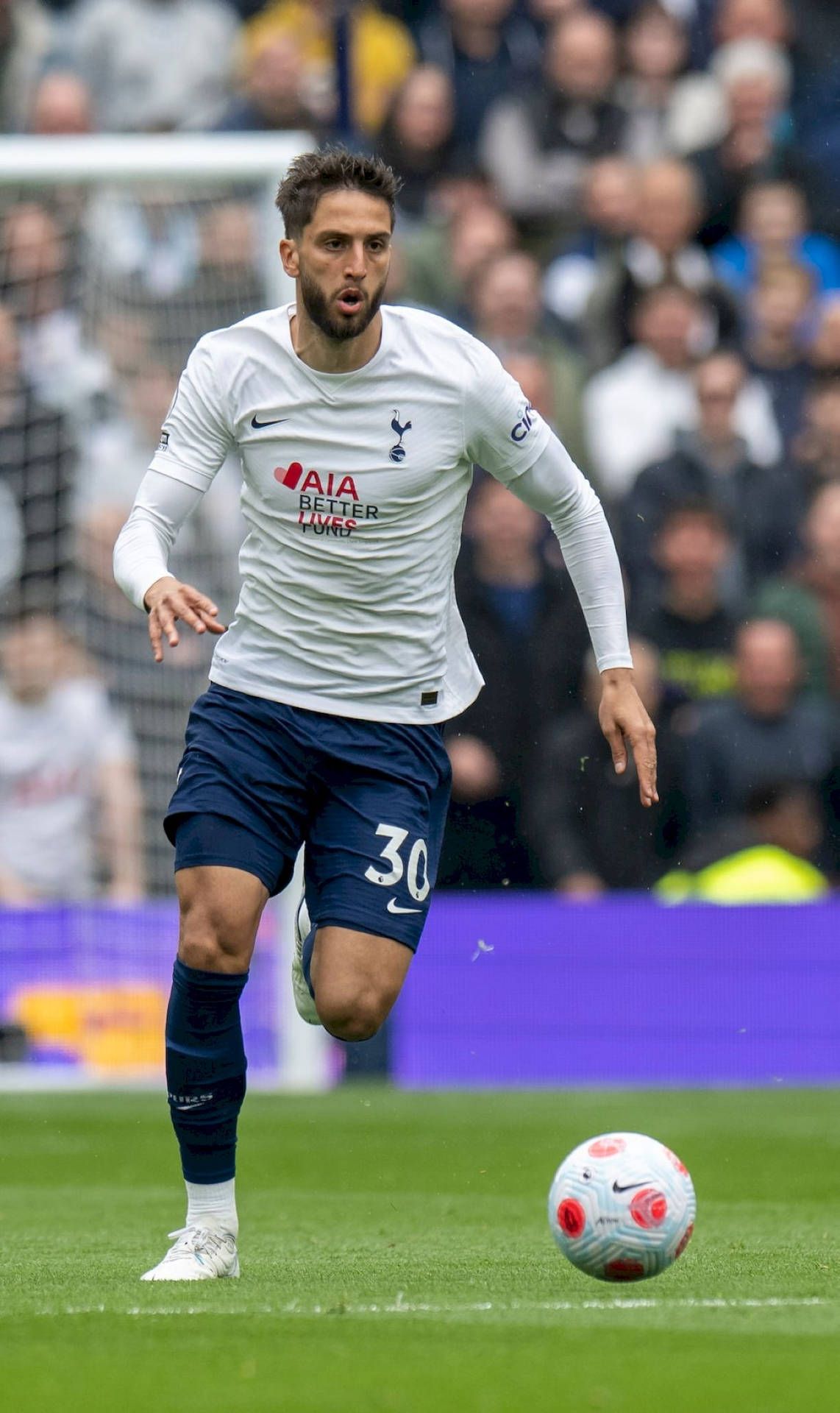 1142x1920 Download Rodrigo Bentancur Playing Football Full Body Wallpaper