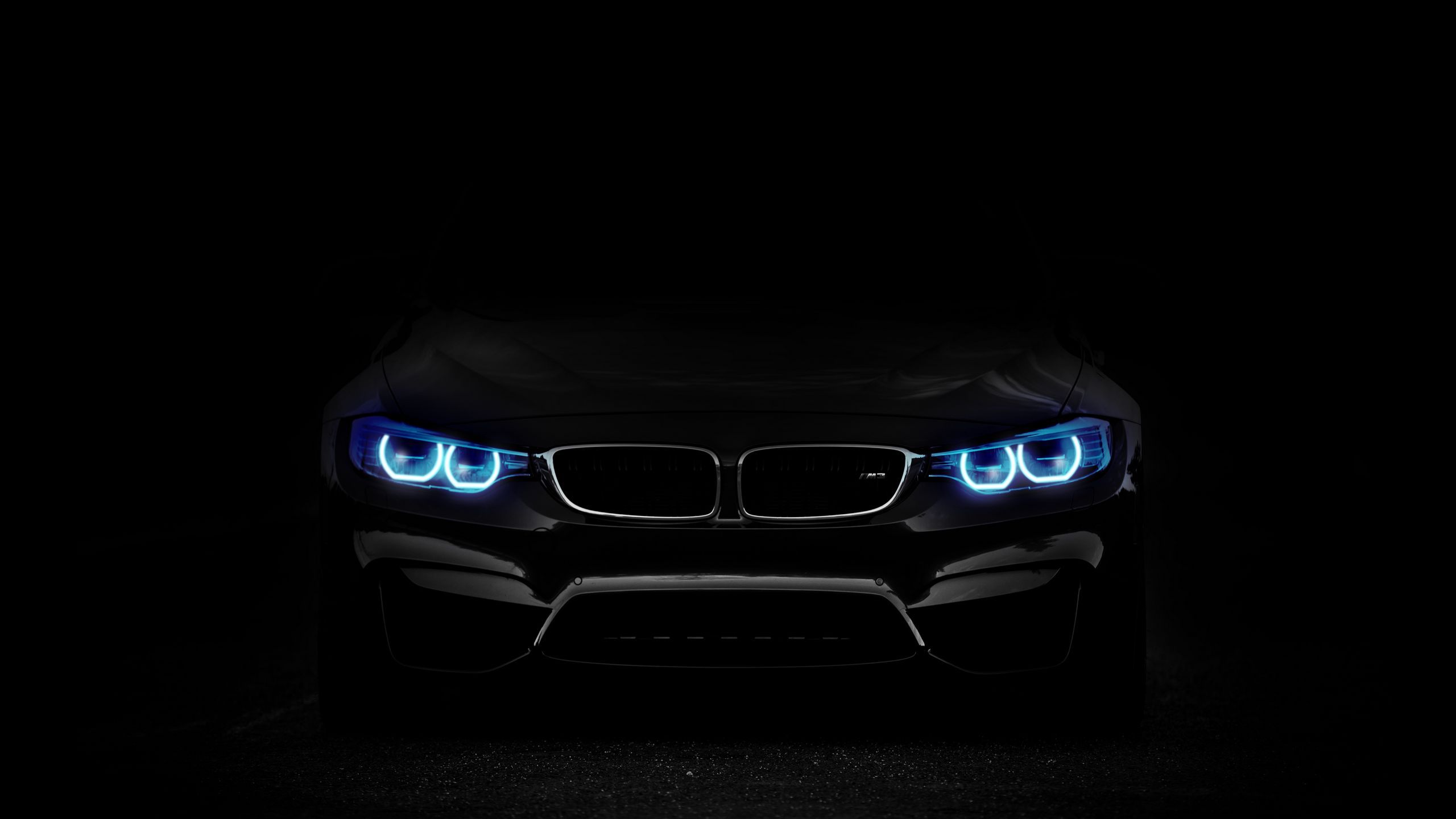 2560x1440 Download wallpaper 2560x1440 bmw, headlights, lights, car, dark widescreen 16:9 HD background